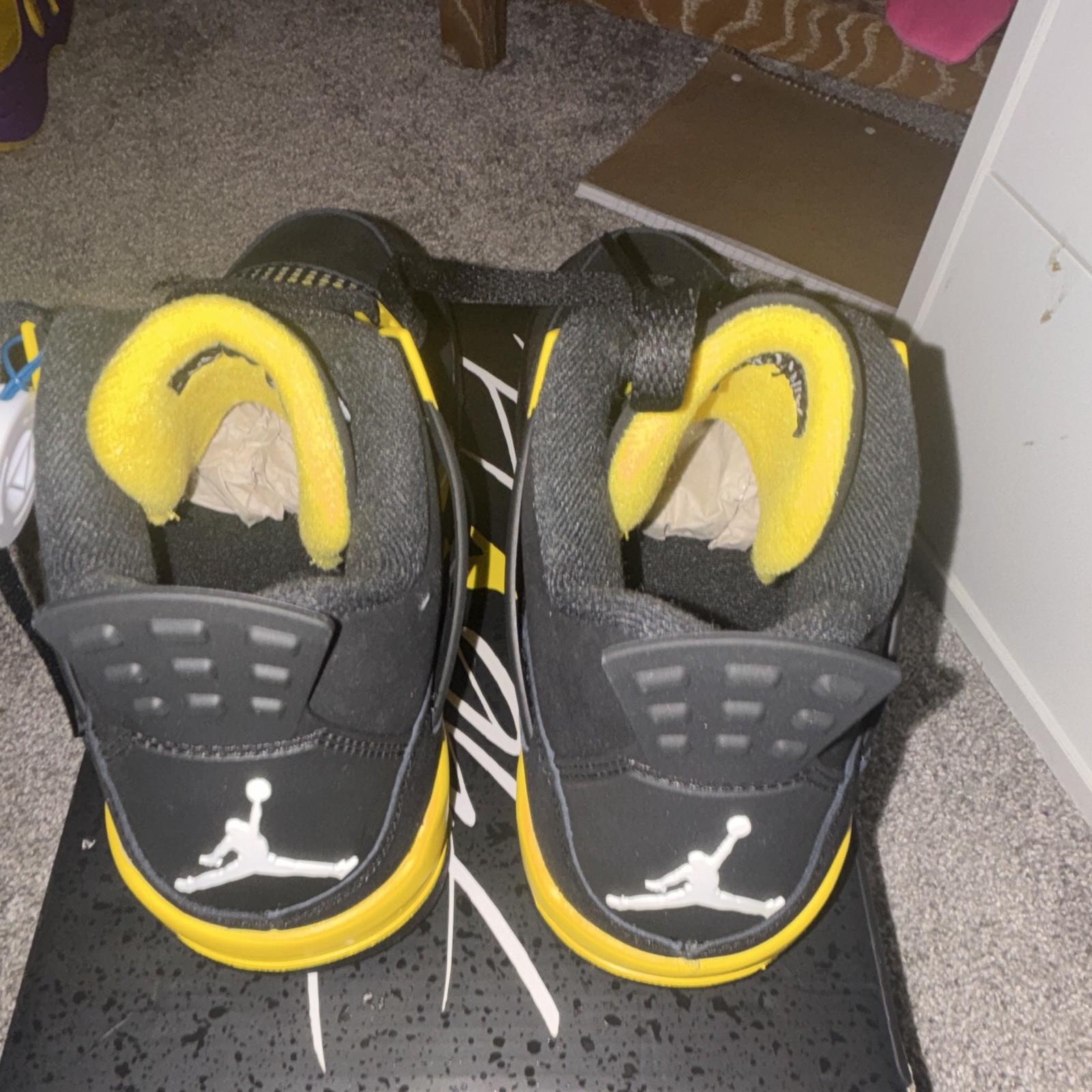 Jordan Air Jordan 4 Retro Thunder Black/Yellow Men’s Mid Top Basketball Sneaker