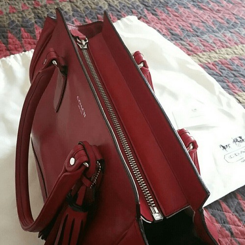 Coach Legacy handbag in black cherry