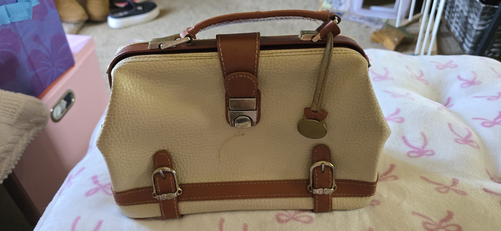Dooney And Bourke Vintage all weather leather purse. 11 inches across and 7 t