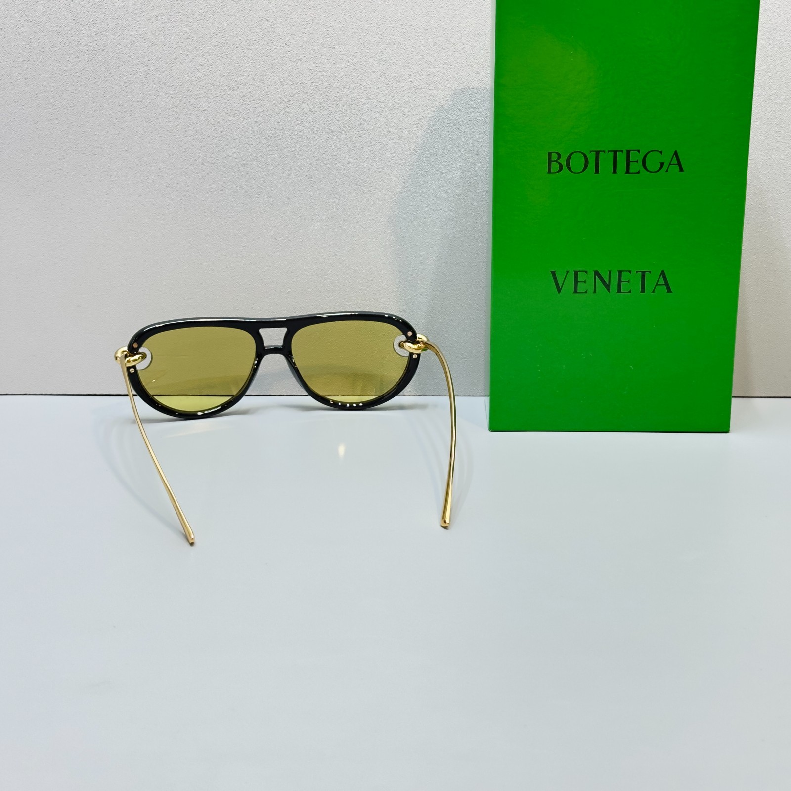 Bottega Veneta BV1418S Black Frame Yellow Lens Gold Knot Aviator Sunglasses