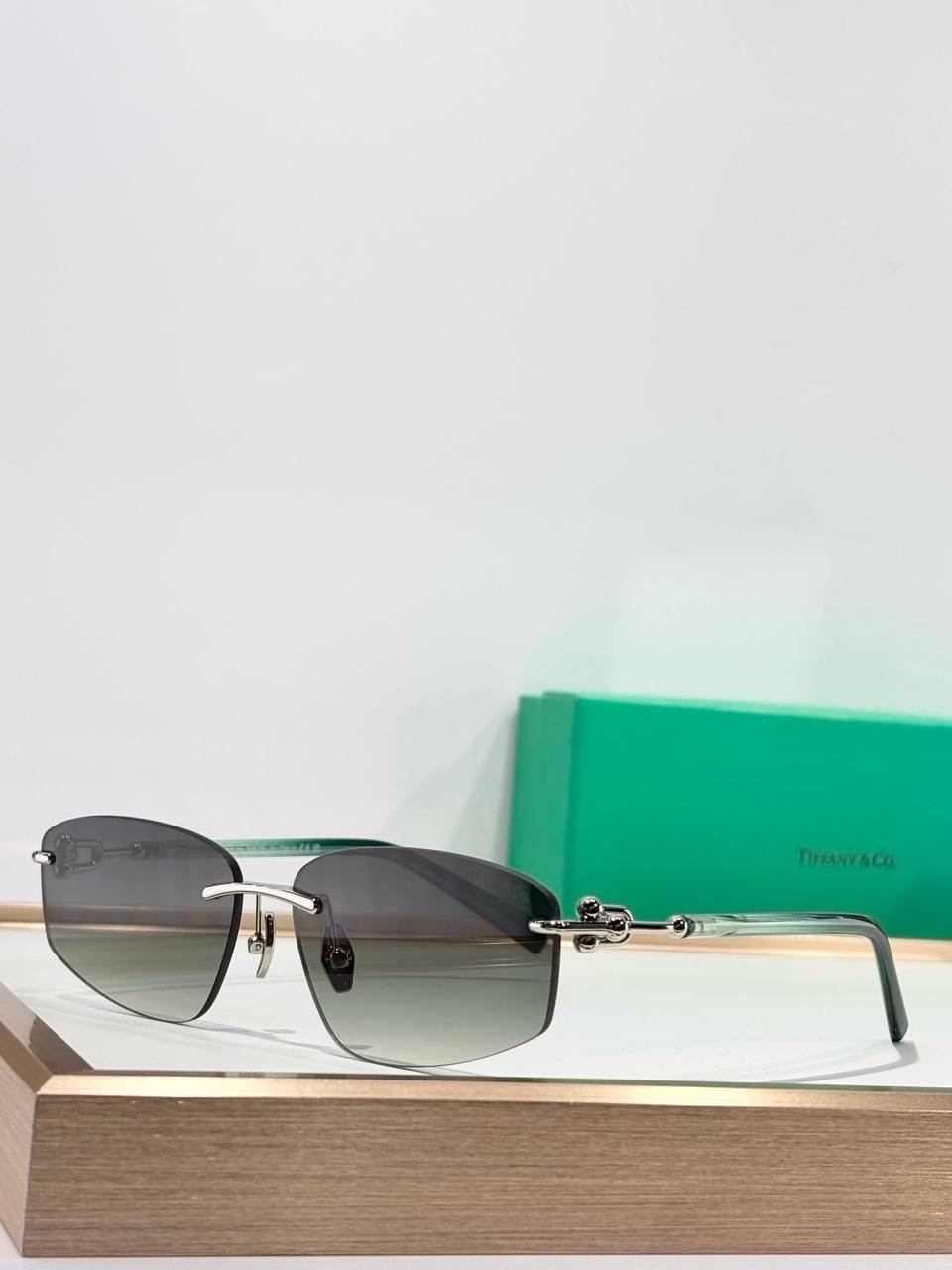 Tiffany & Co TF3114 Rimless Geometric Sunglasses Gradient Gray Blue Lens Unisex