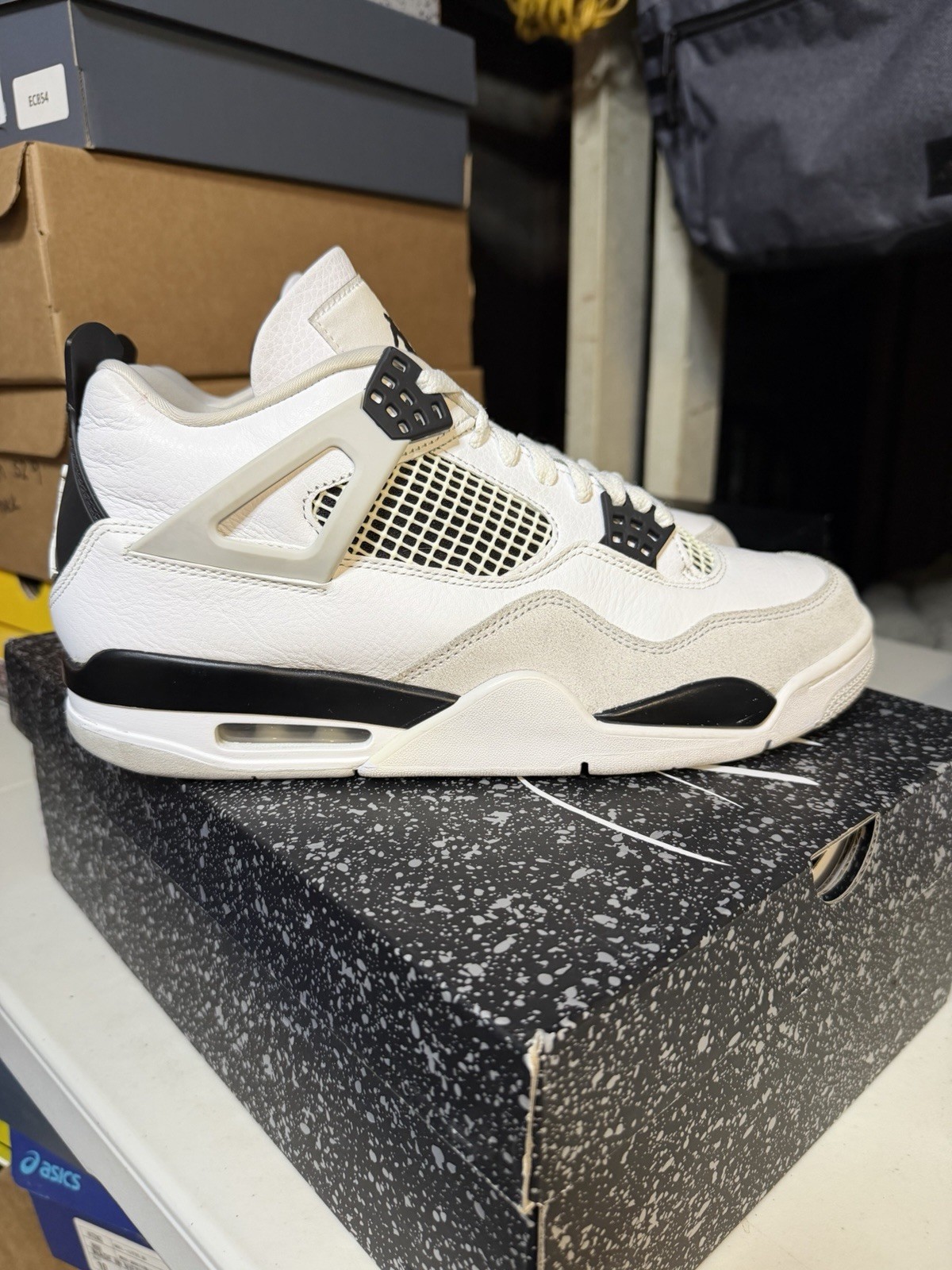 Size 10.5 – Jordan 4 Retro Mid Military Black