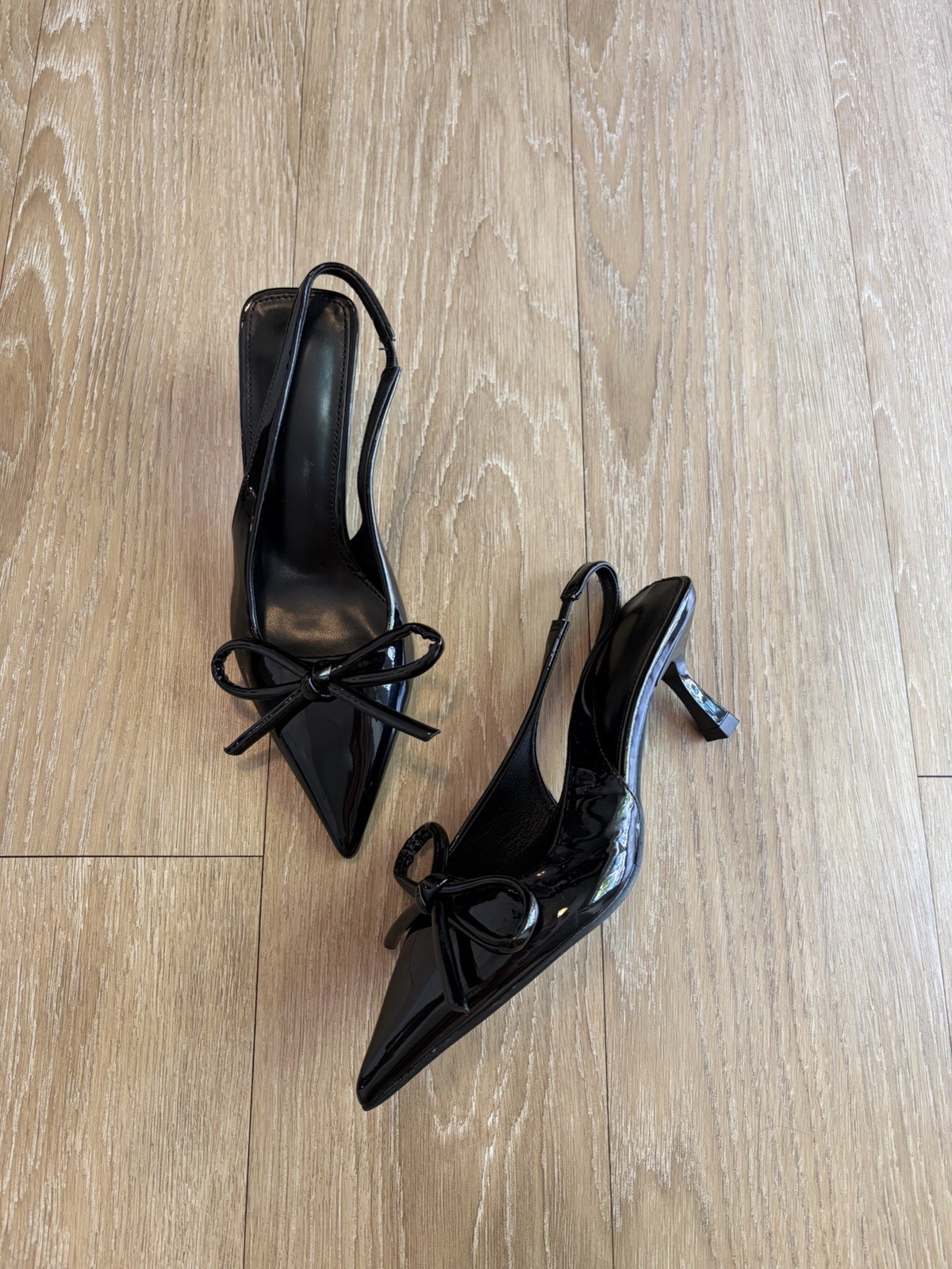 Black Patent Pleather Pointed-Toe Slingback Pumps w/ Bow Detail