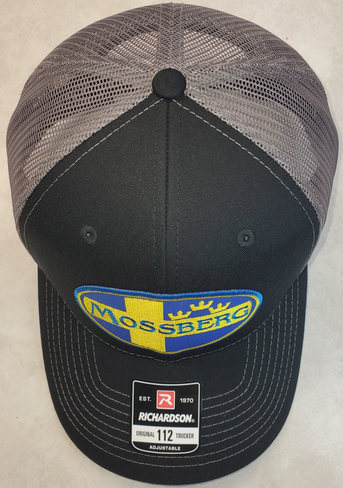 Mossberg Firearms Patch on Richardson 112 Trucker Hat Snapback Black/Charcoal