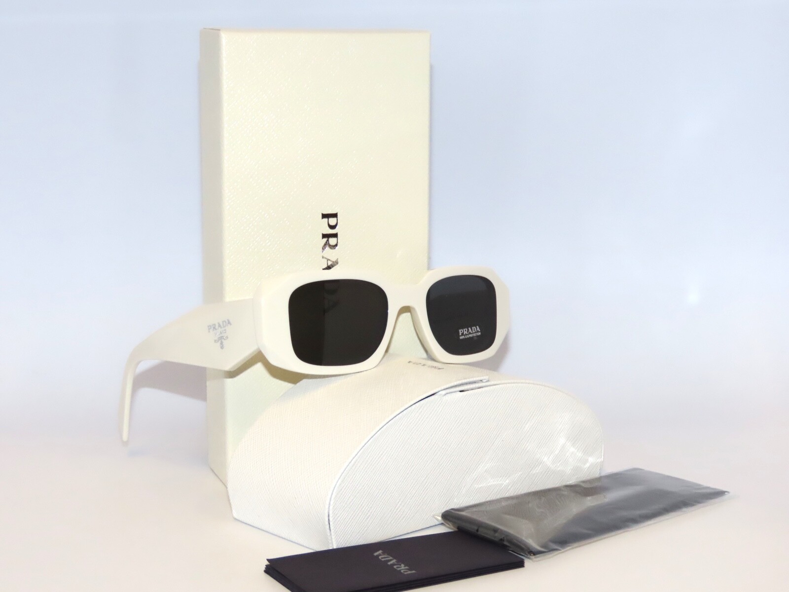 Prada SPR17WS 17 1425S0 Talc Dark Gray Sunglasses 17W