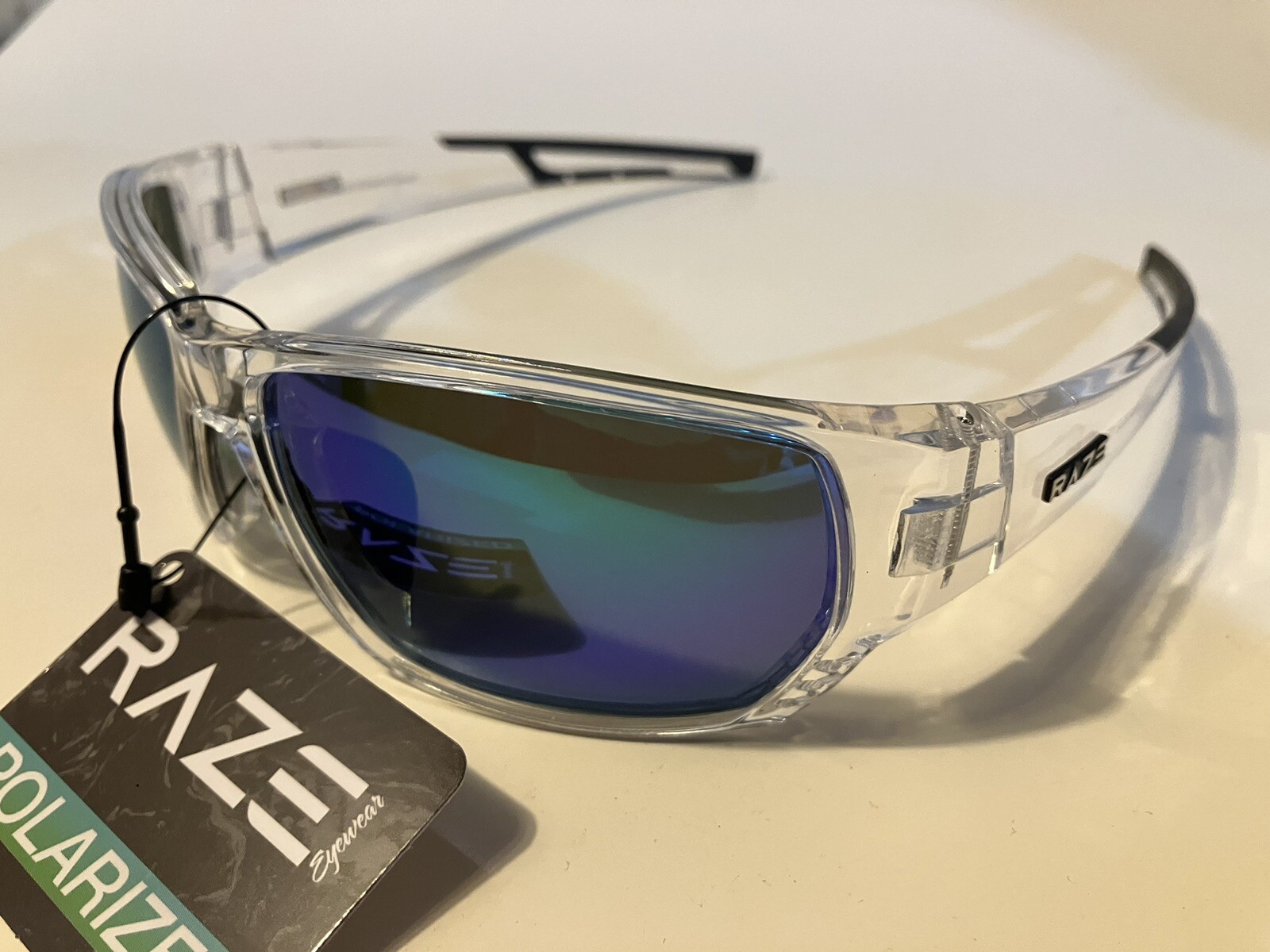 RAZE Eyewear Sunglasses Sonar Polarized Clear Frame Blue Mirror Smoke 28856
