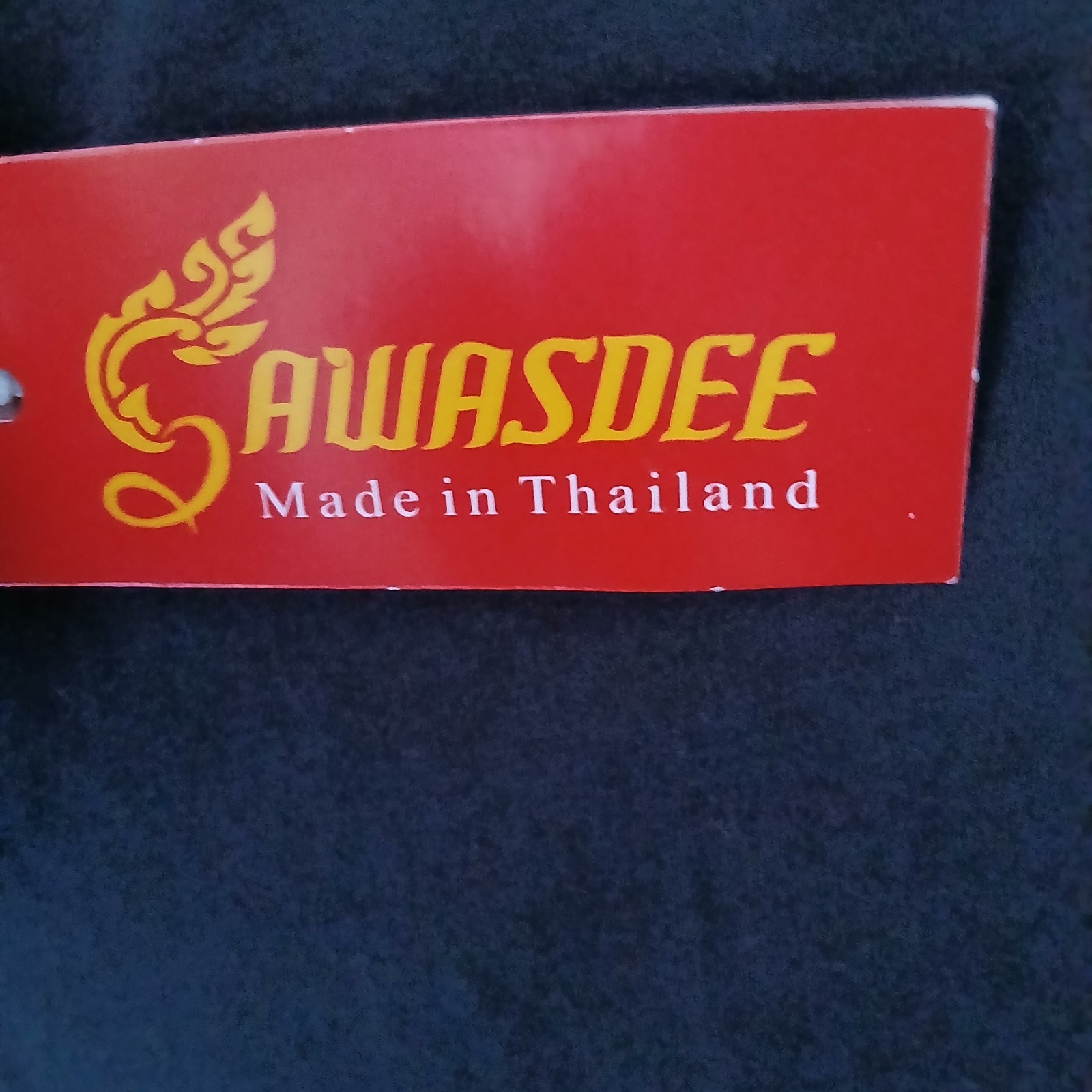 Thailand souvenir shirt featuring a detailed gold-colored elephant