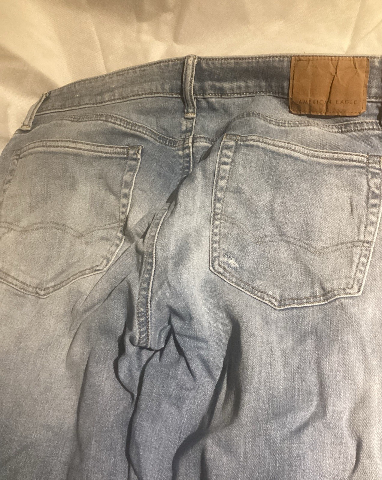 American Eagle Men’s Next Level Air Flex Slim US 33×32–Light Blue -Distressed