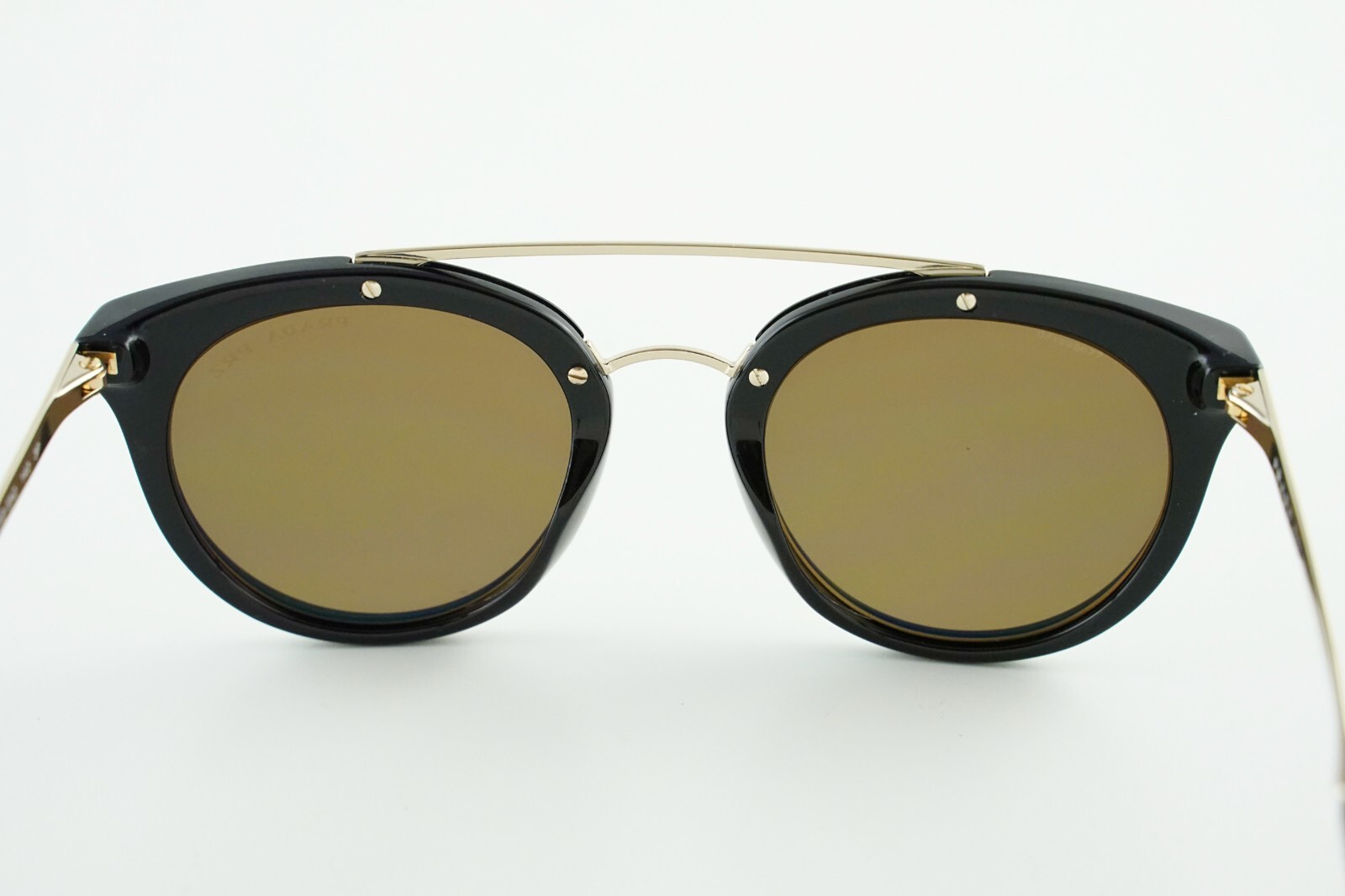 Pre-Owned SPR 23S Prada 1AB-5N2 Gold Polished Black/Mirrored Gold 52-22-140 3P
