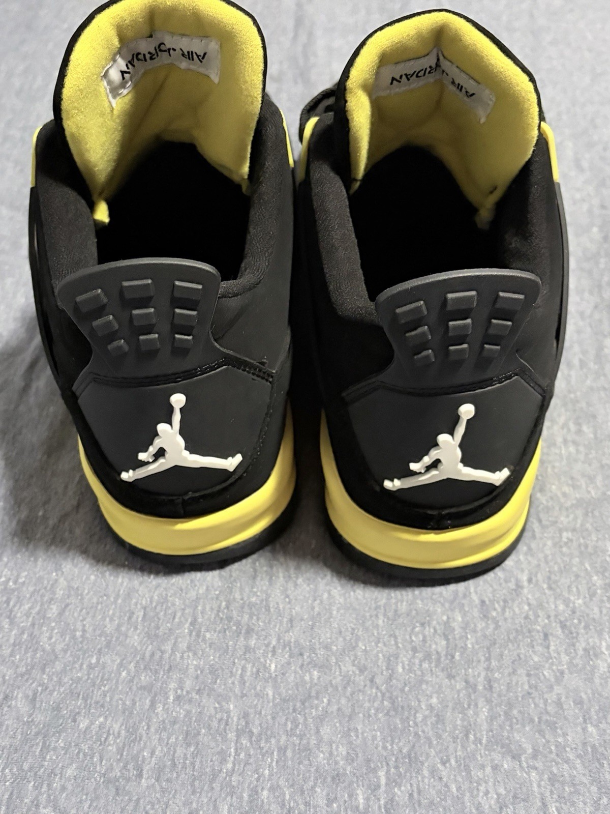 Jordan 4 Retro Thunder. Black/Tour Yellow DH6927-017