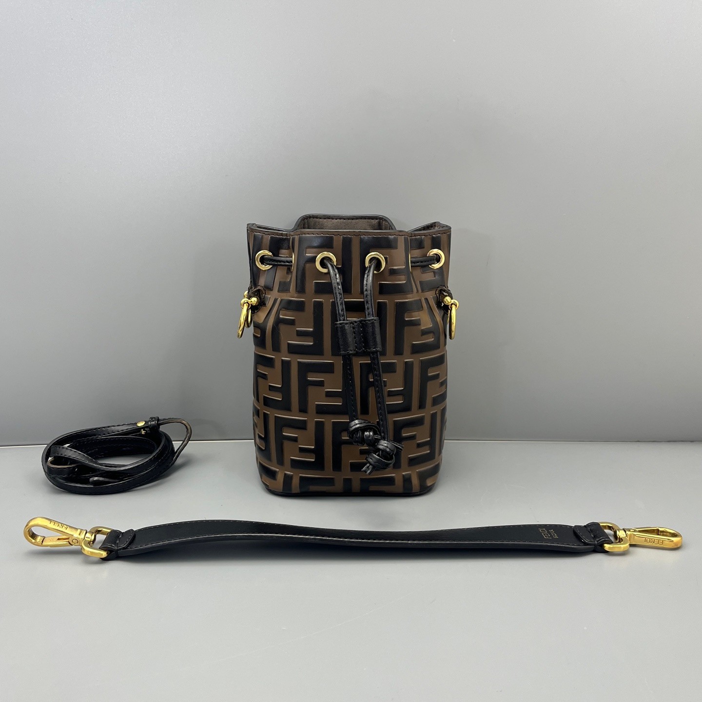FENDI Mon Tresor Bucket Crossbody Bag FF Mini Black Brown Embossed Leather Gold