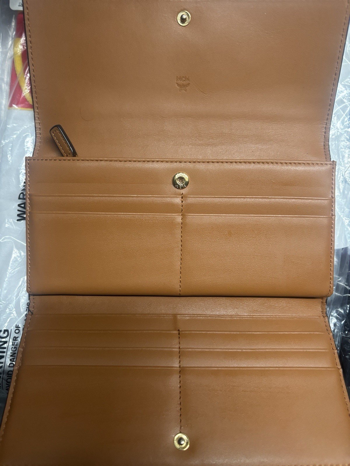 Authentic MCM Large Tri Fold Wallet in Visetos Original Cognac