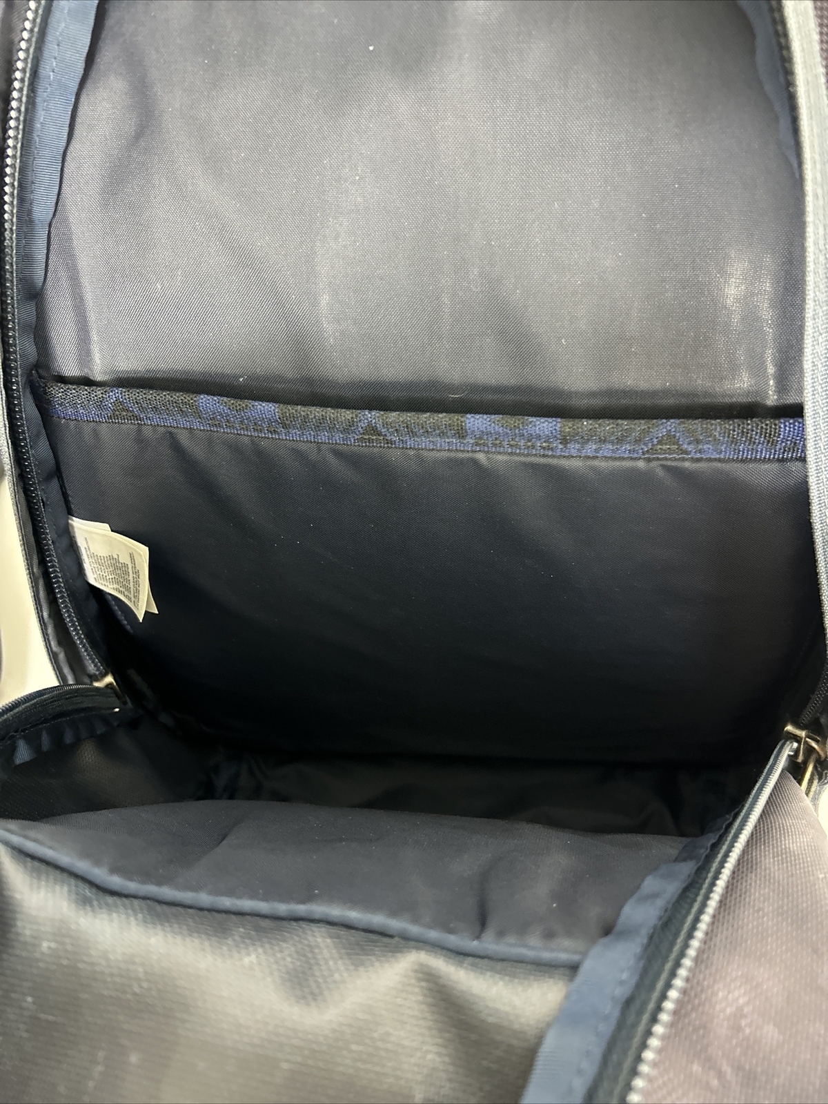 The North Face Lineage 20L backpack book bag navy used Flaw Small Rip On Side