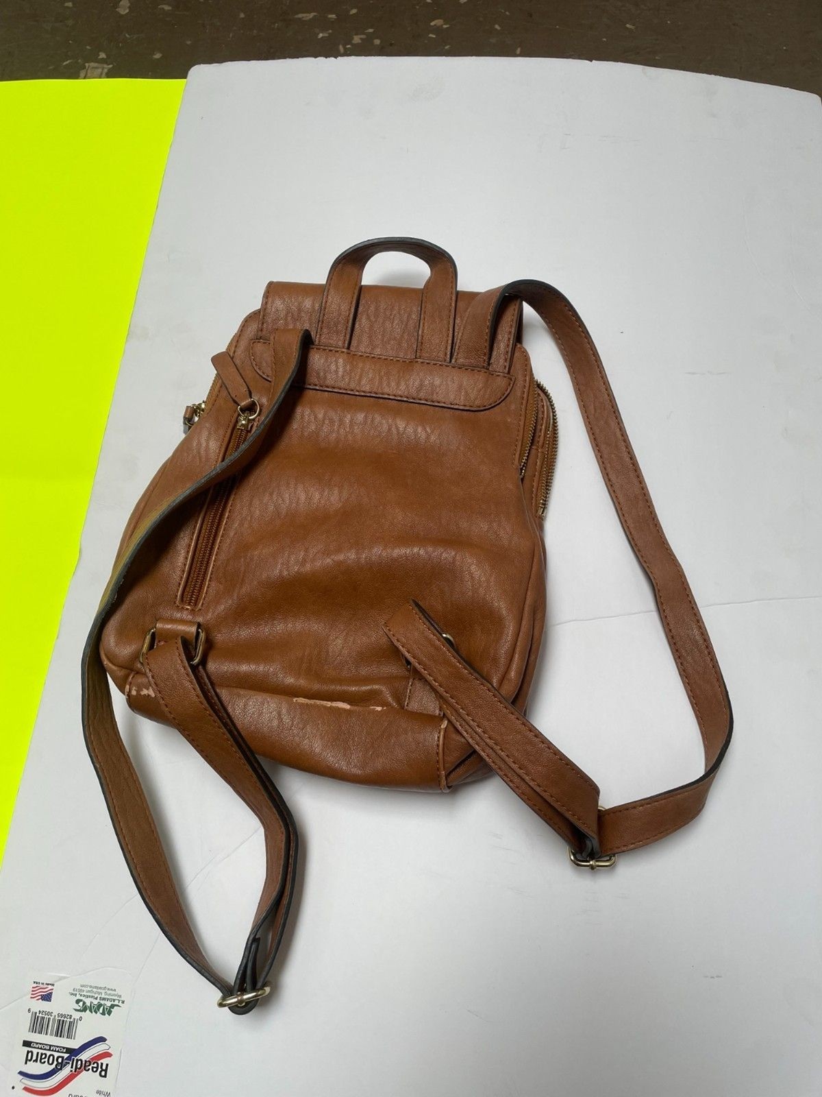 Calvin Klein Reyna Novelty Key Item Flap Backpack Caramel Color