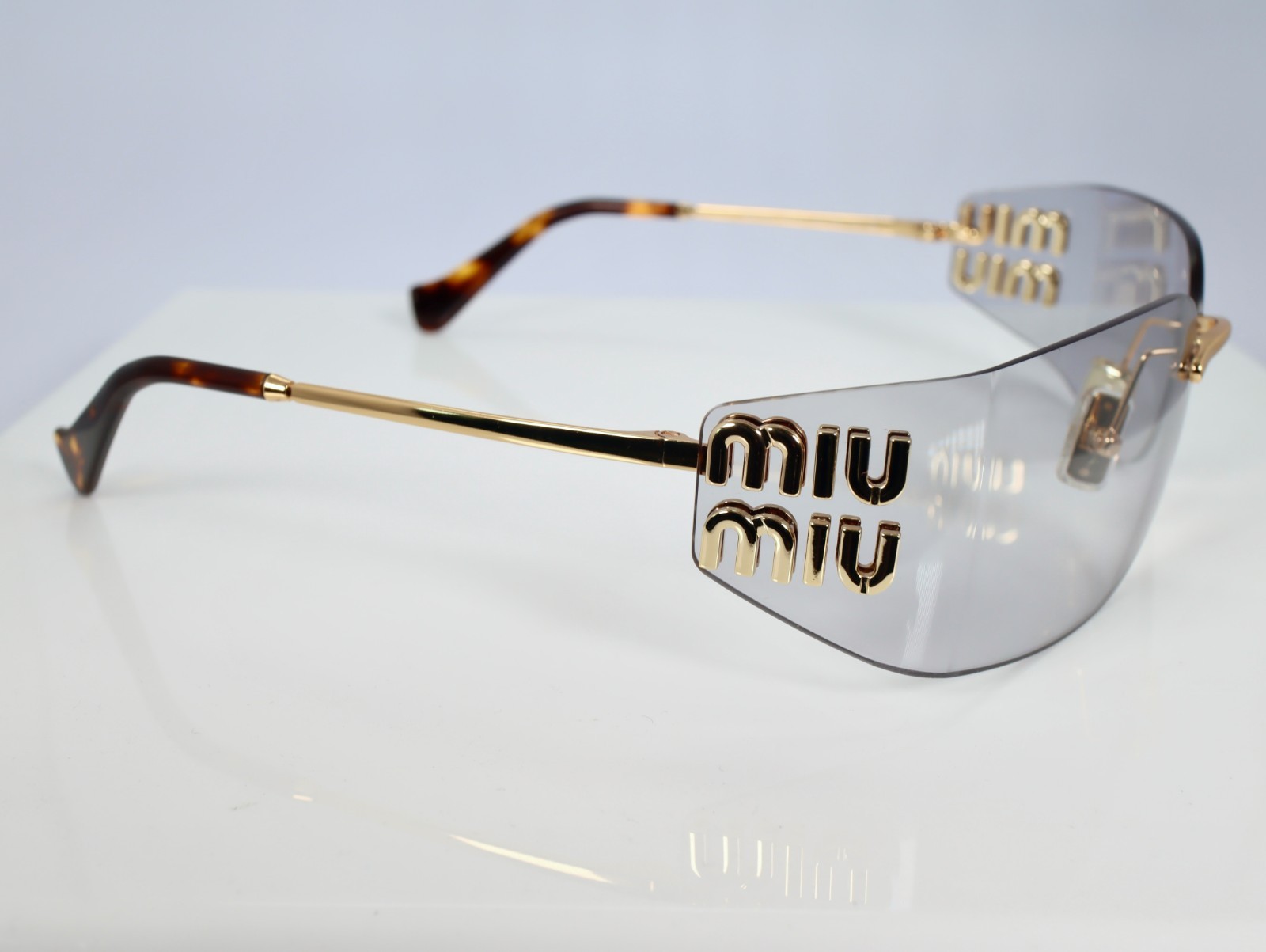 Miu Miu MU A51S 5AK50K 75mm Rectangle Sunglasses in Gold with Light Gray Lenses
