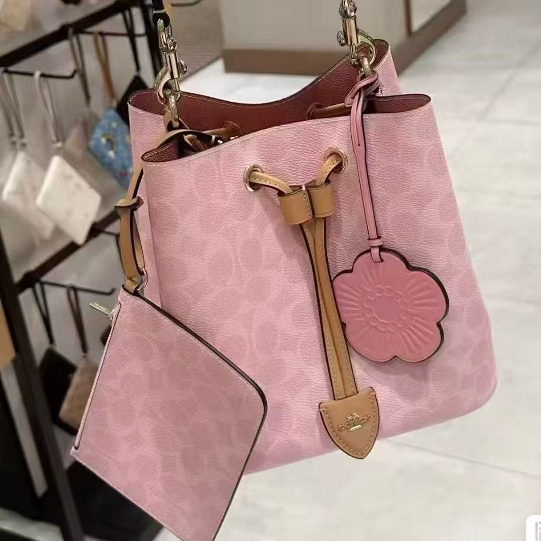 Coach CEA23 Rowan Bucket Bag In Signature Canvas With Charms Powder Pink NEW