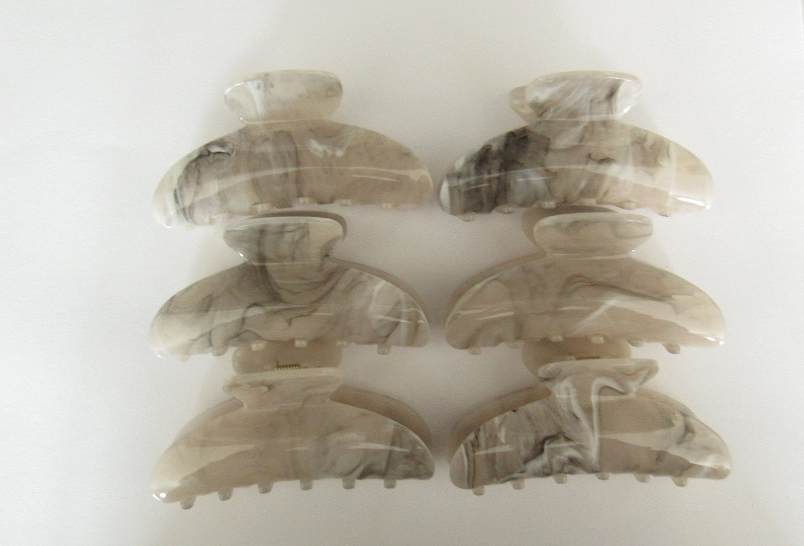 One random marbled beige white black gray acrylic hair claw clip