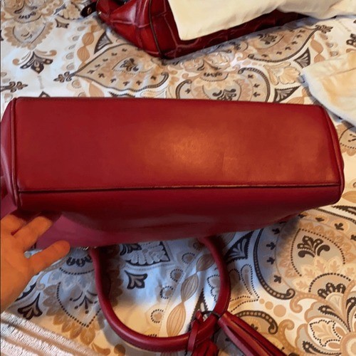 Coach Legacy handbag in black cherry