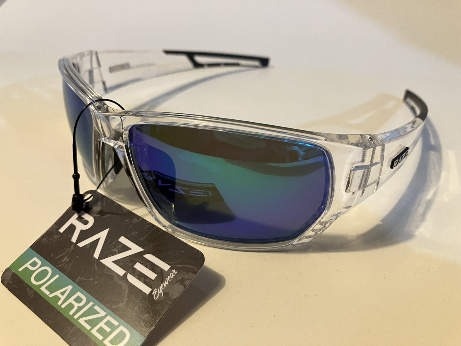 RAZE Eyewear Sunglasses Sonar Polarized Clear Frame Blue Mirror Smoke 28856