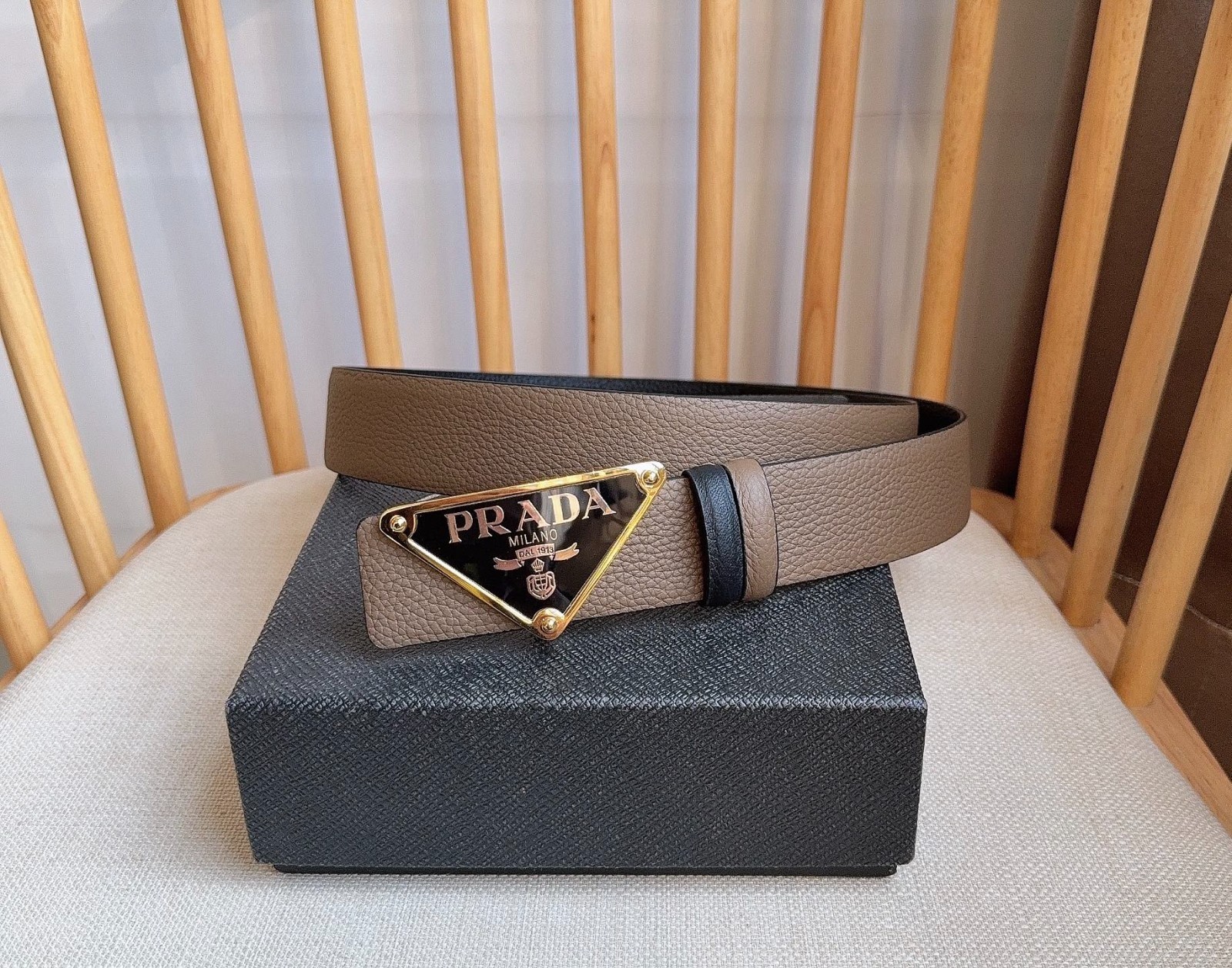 Prada men’s leather belt in Black/Brown