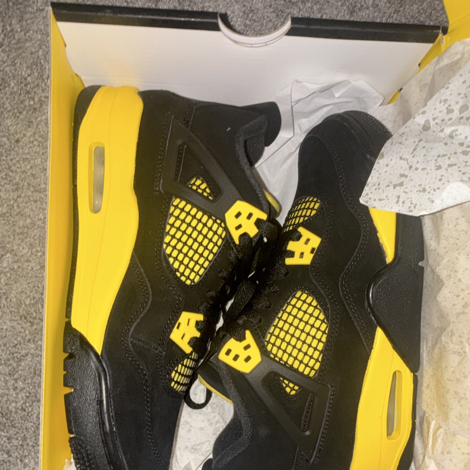 Jordan Air Jordan 4 Retro Thunder Black/Yellow Men’s Mid Top Basketball Sneaker