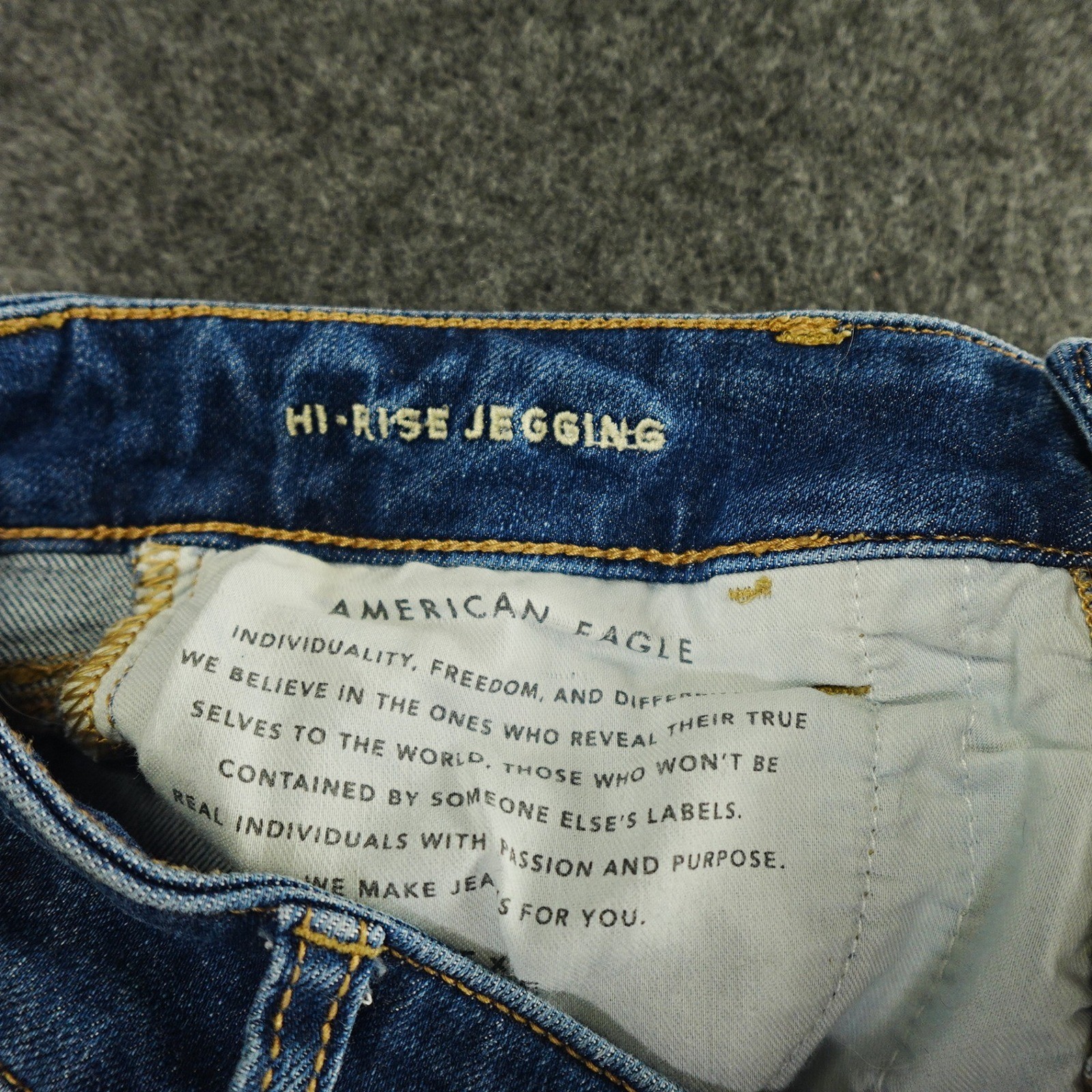American Eagle Hi-Rise Jegging Distressed Ripped Raw Hem Blue Wash Jeans