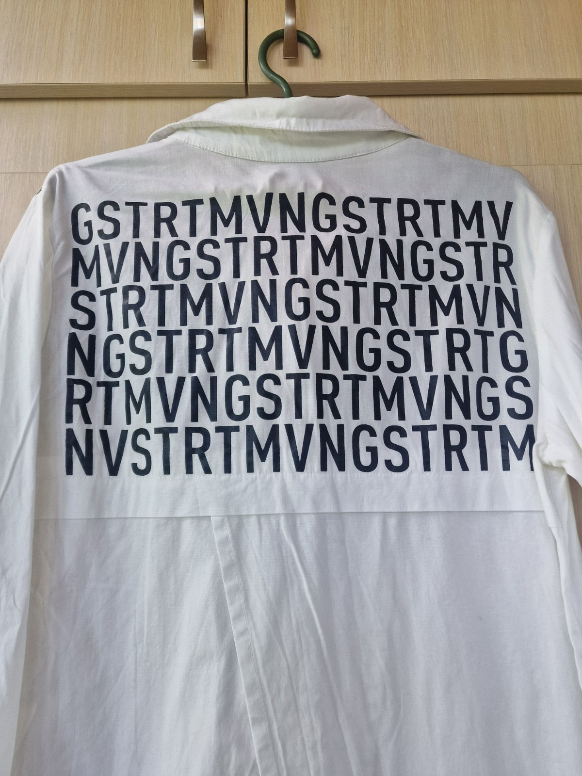 women’s shirt,size 48,white,long,with buttons,long sleeves,buttons on the side