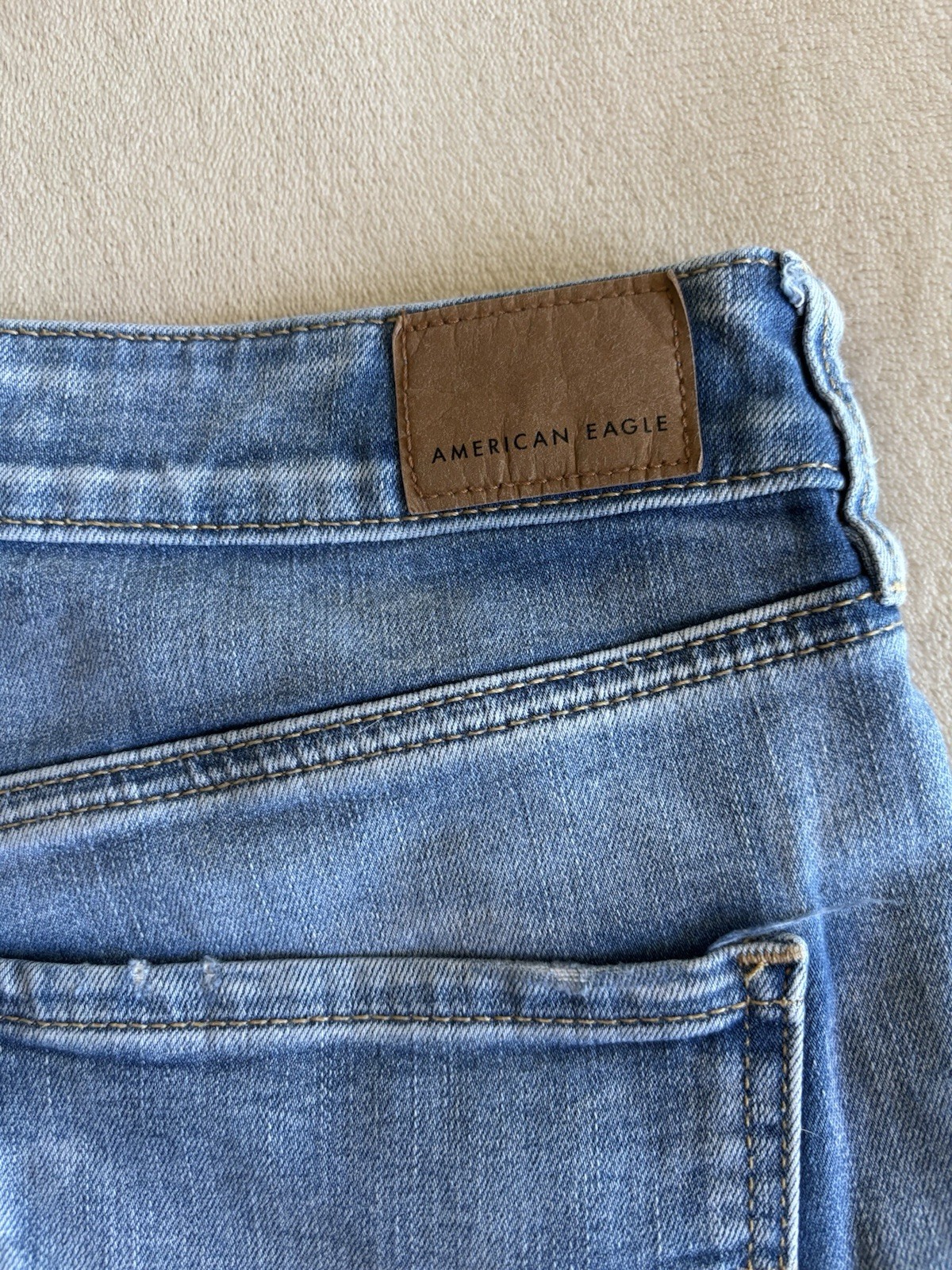 American Eagle Women’s Blue Light Wash High Rise Distressed Jegging