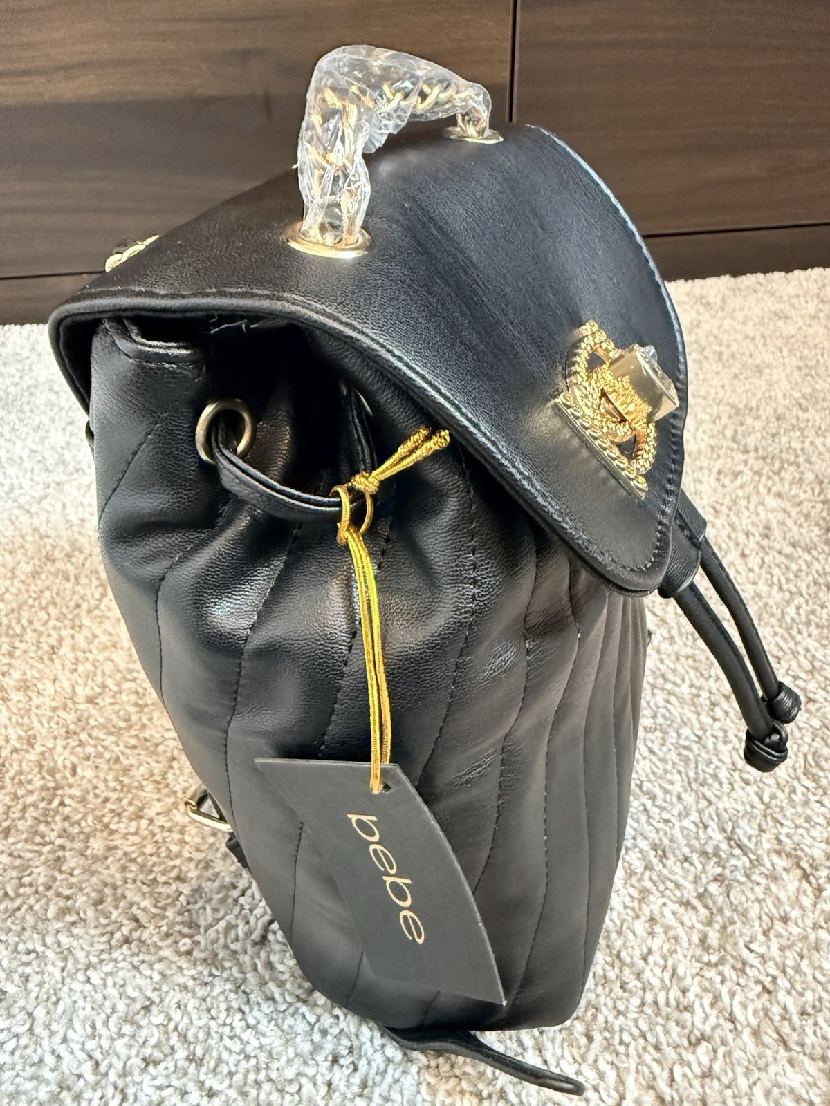 Bebe Black Backpack Drawstring Turn Lock Quilted Gold Hardware Adjustable Strap