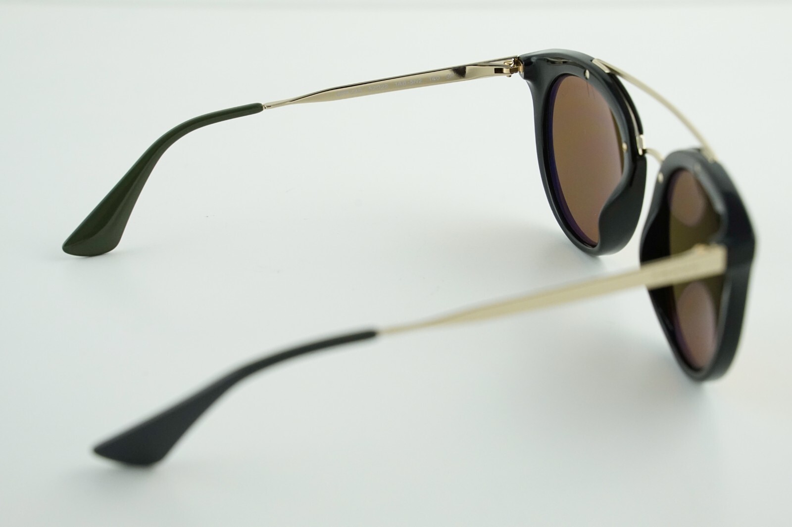 Pre-Owned SPR 23S Prada 1AB-5N2 Gold Polished Black/Mirrored Gold 52-22-140 3P