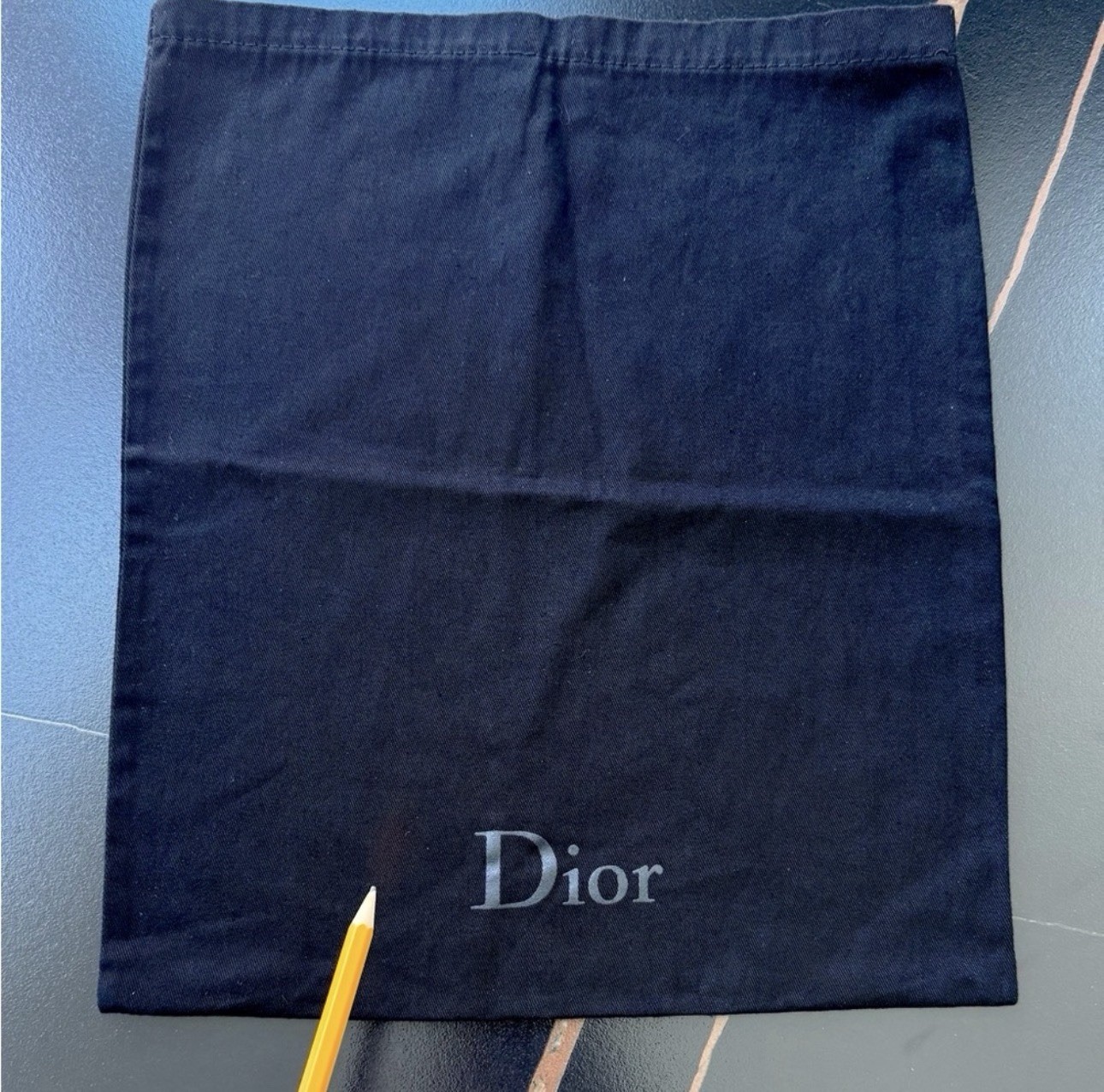 Dior original dust bag in black approximately 14.5 x 12 inches.