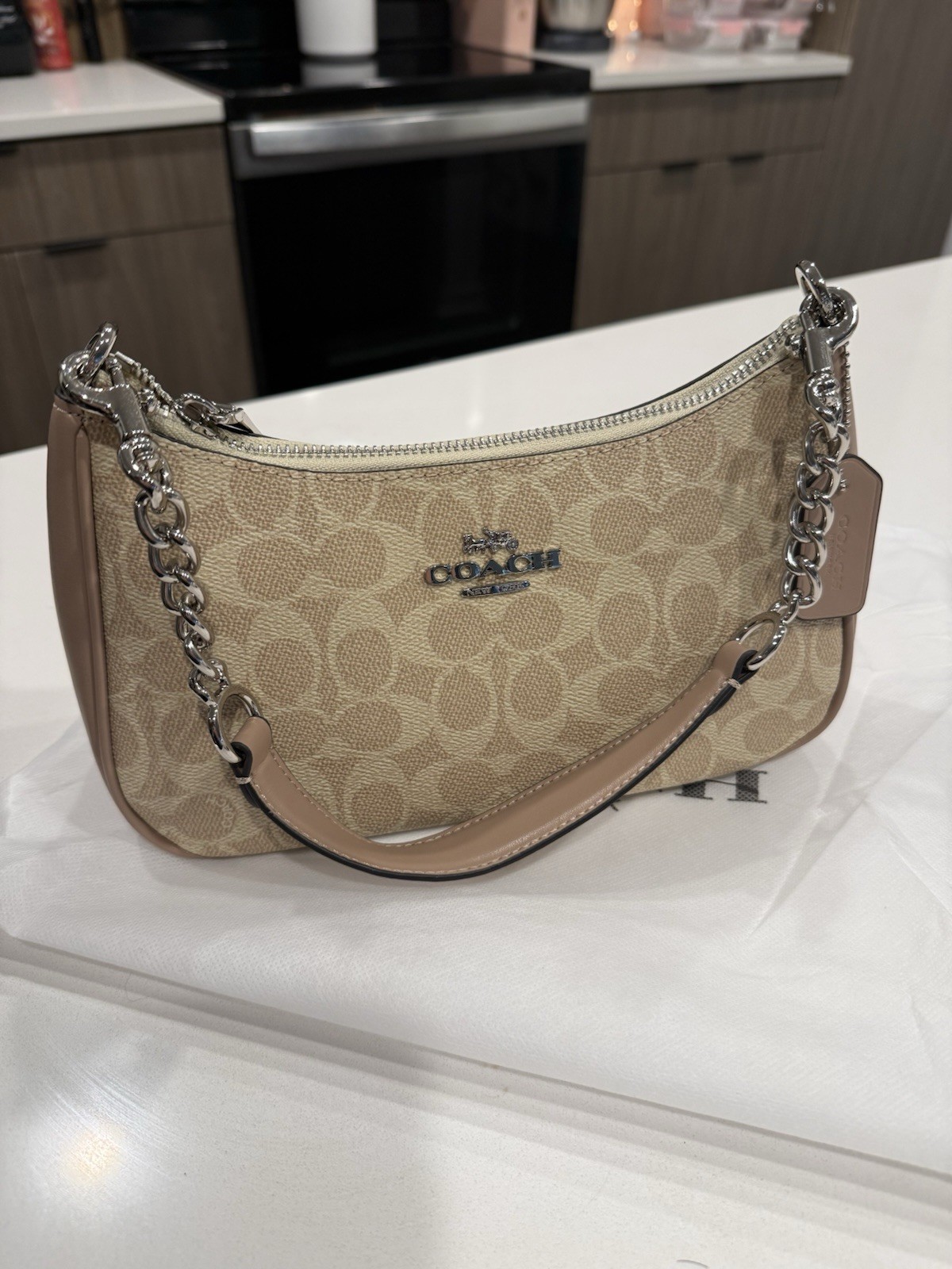 Tan and Beige Teri hand bag, comes with longer strap! Brand new never used.
