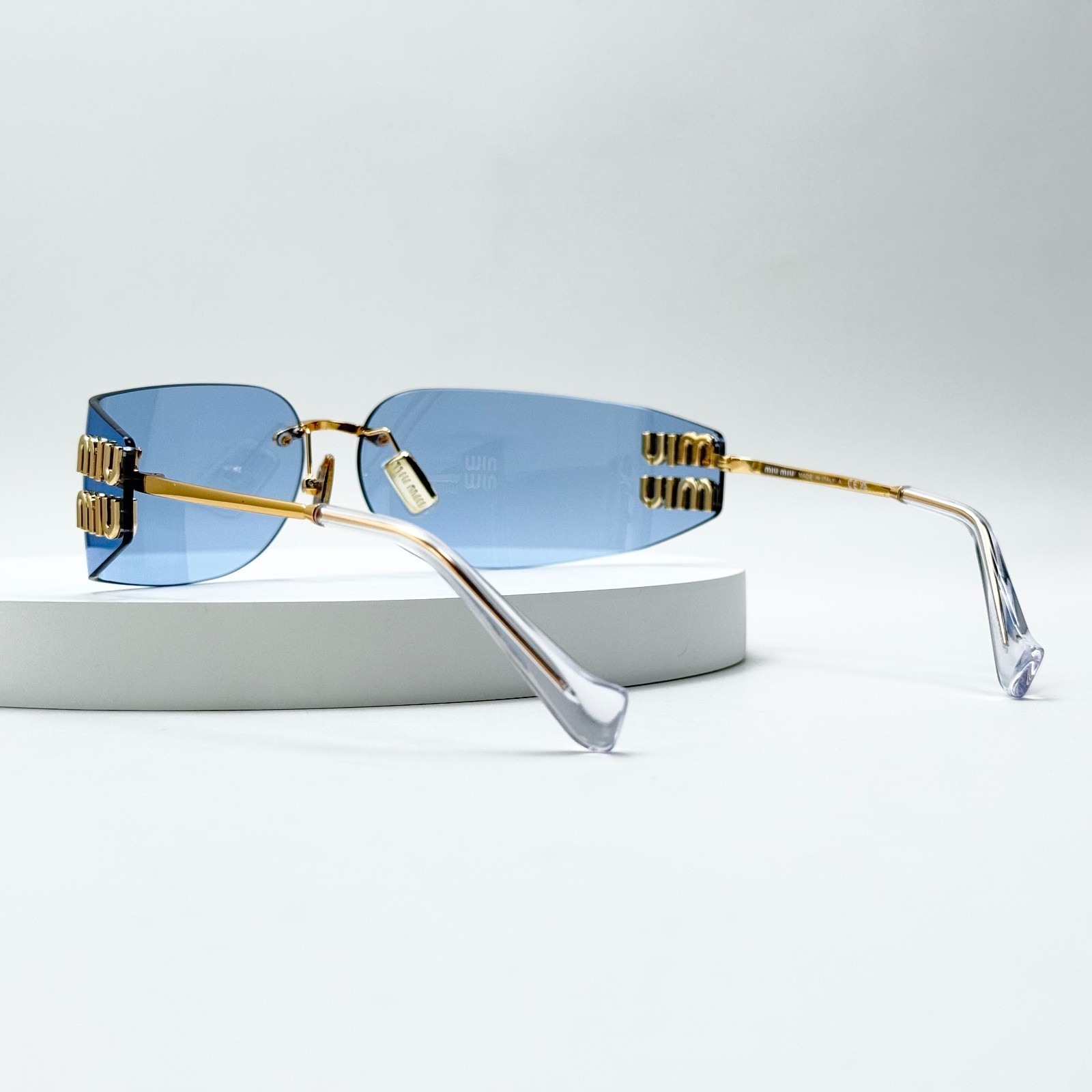 Miu Miu SMUA51 Wrap Sunglasses Pale Gold Frame Blue Lens Women 75-14-110