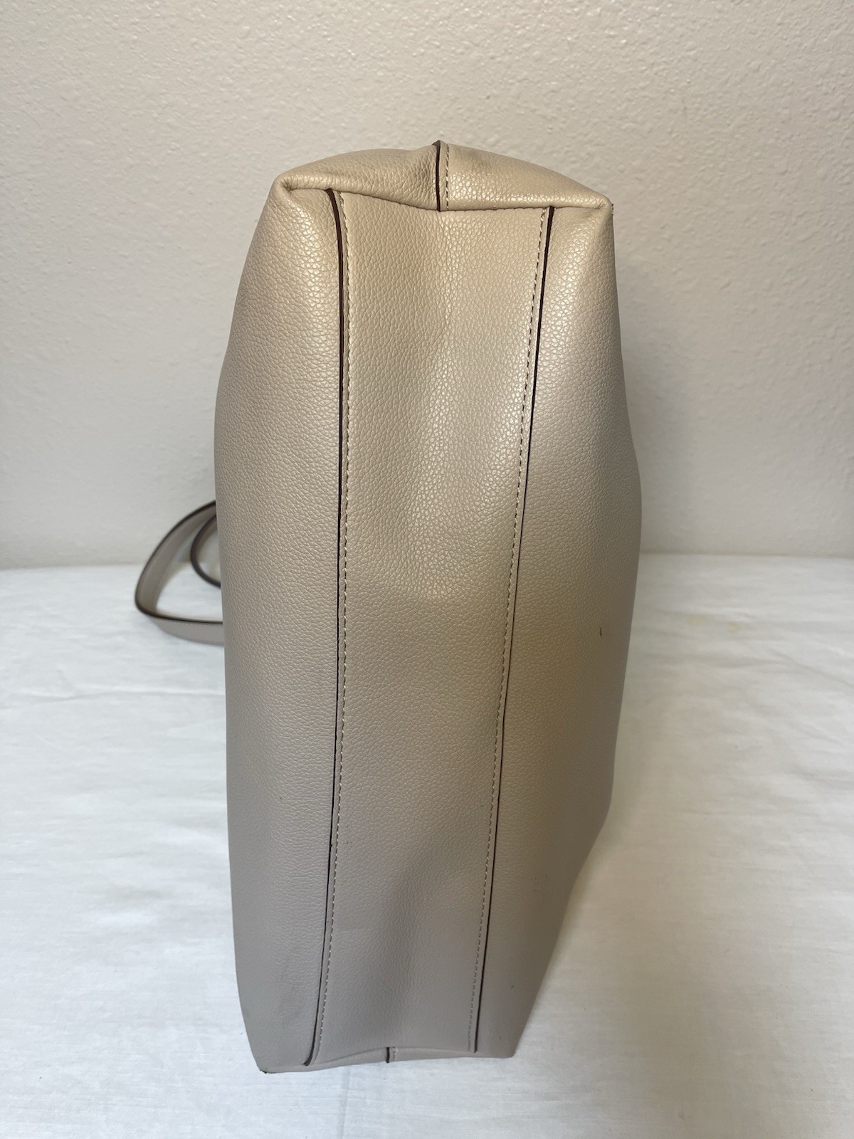 Anne Klein Taupe Vegan Pebbled Texture Tote with Lion and Tassel Charms