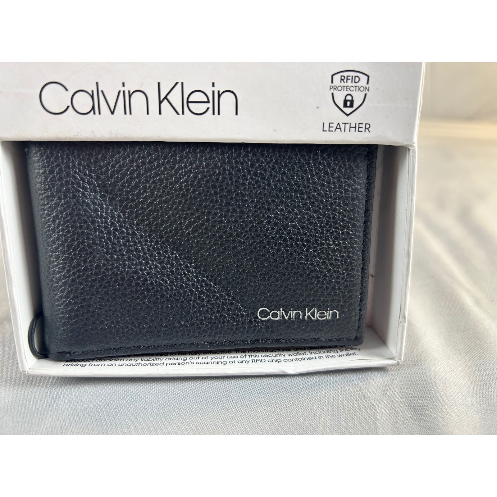Calvin Klein Mens Black Leather RFID Bifold Wallet Pebbled Logo PCNX000052