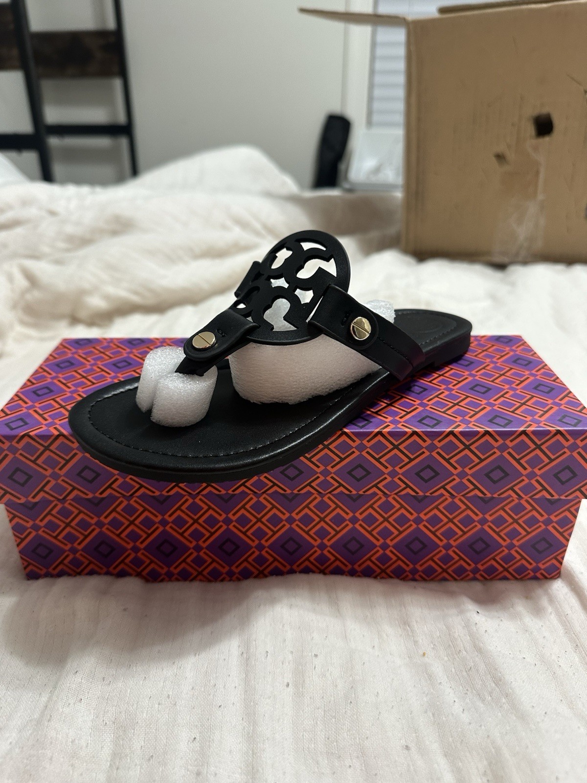 Tory Burch Women’s matte black sandal size available 38