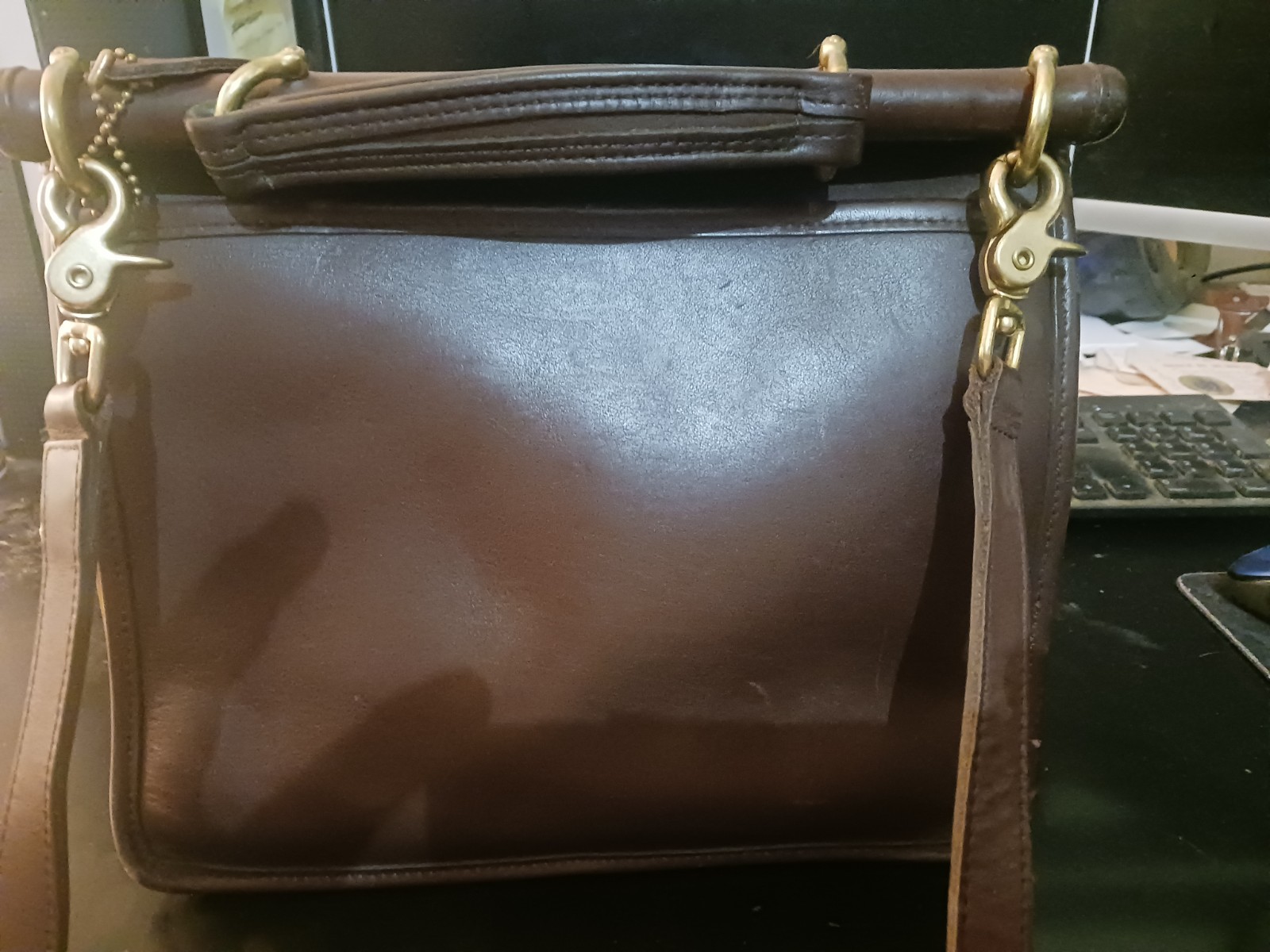 No. E80-9927 identifies your bag as a Coach Willis Bag, Style 9927 made in 1990.