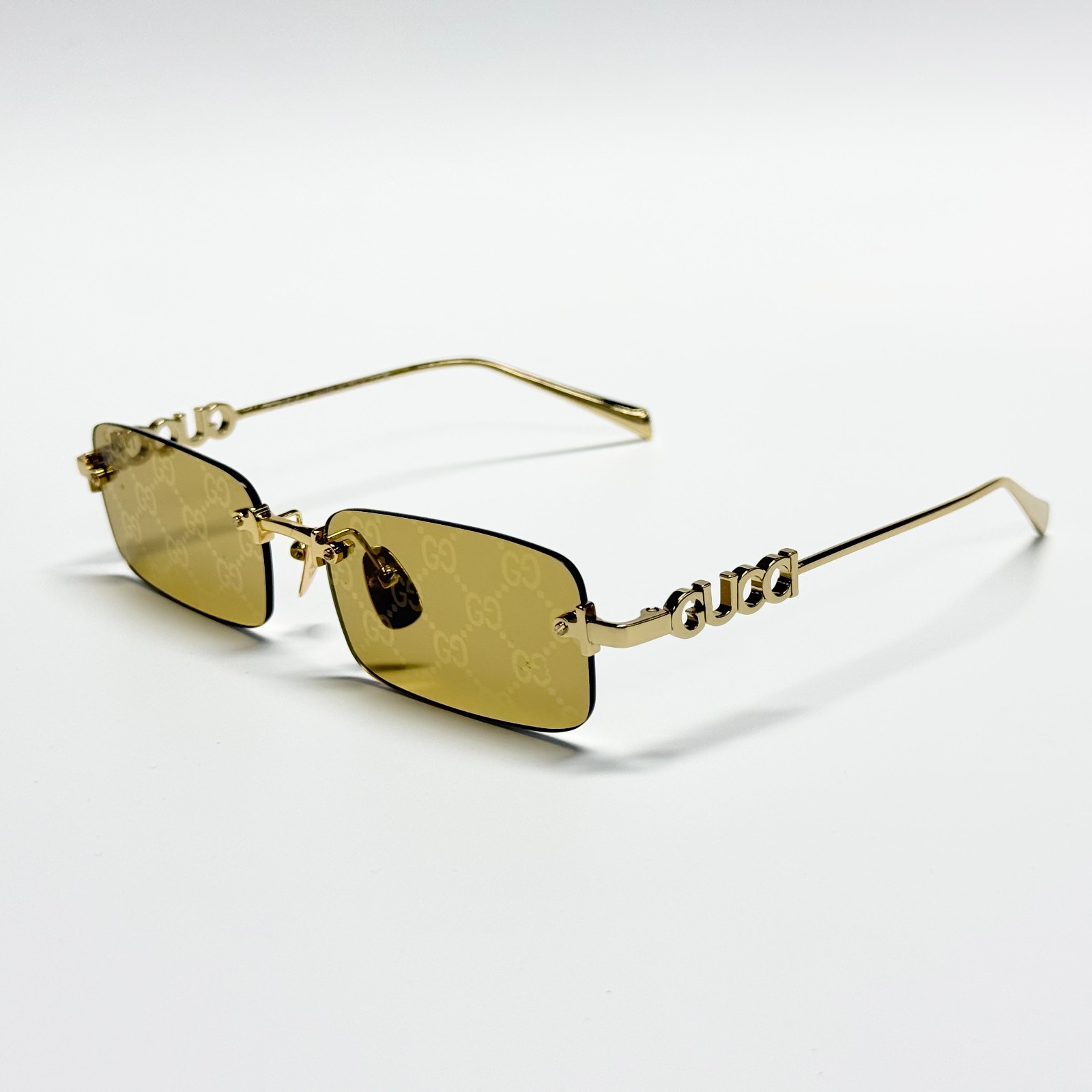 Gucci GG1808S Rimless Rectangle Sunglasses Gold Frame Gold GG Lens 52mm