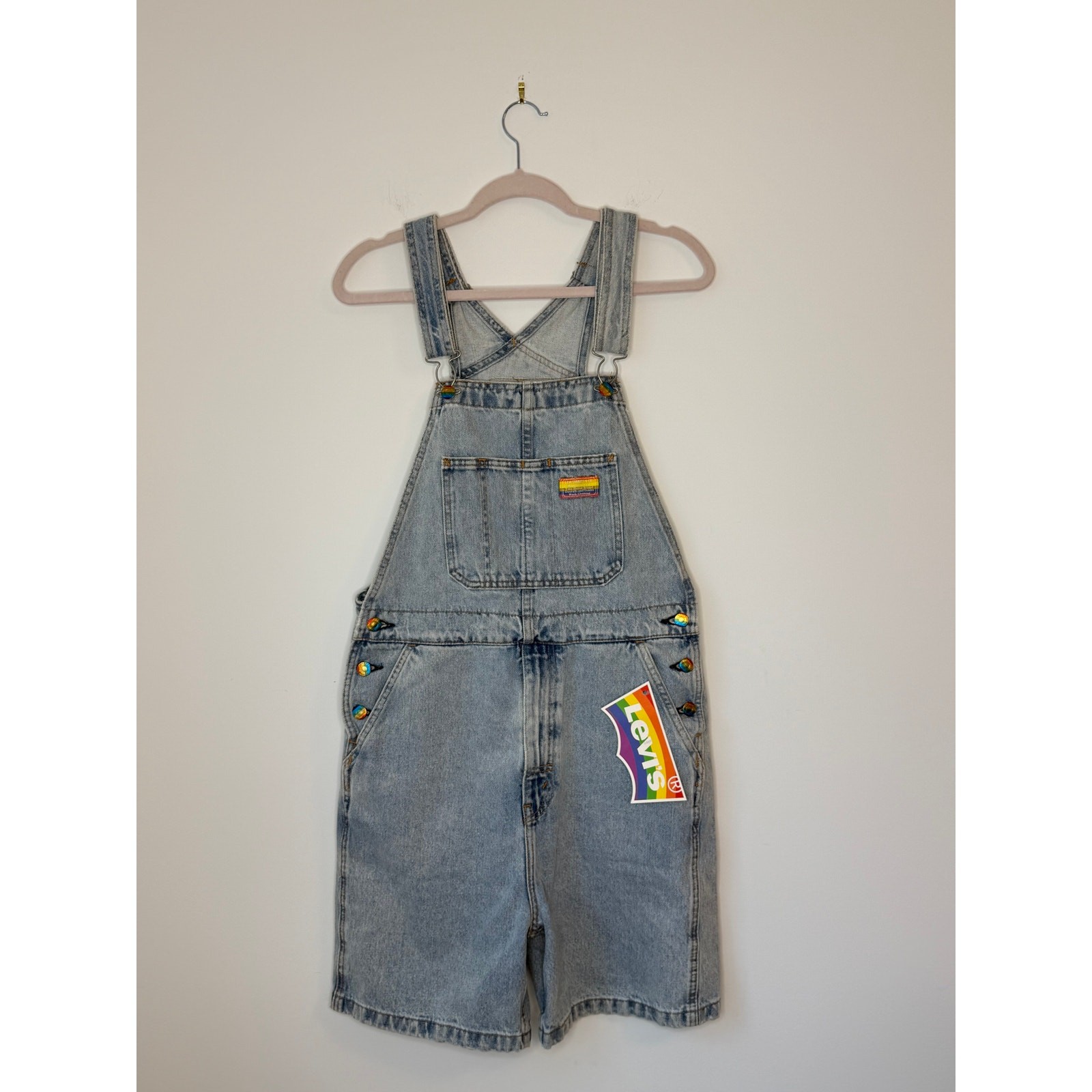 Levi’s Pride Liberation Shortalls Overall Shorts in a light acid wash