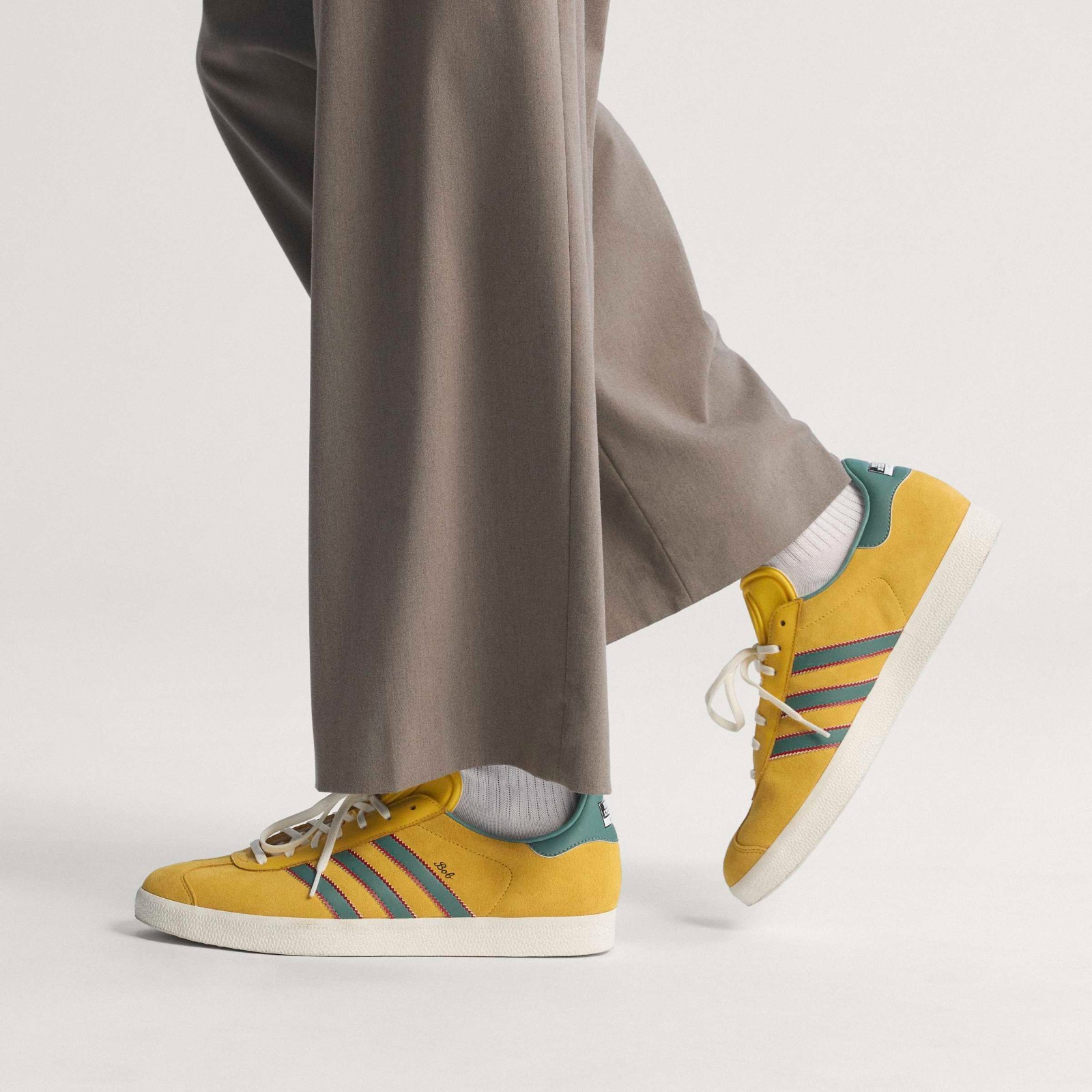 Adidas Men’s Gazelle Jamaica x Bob Marley Shoes Bold Gold/None/Pure Ruby KJ3532