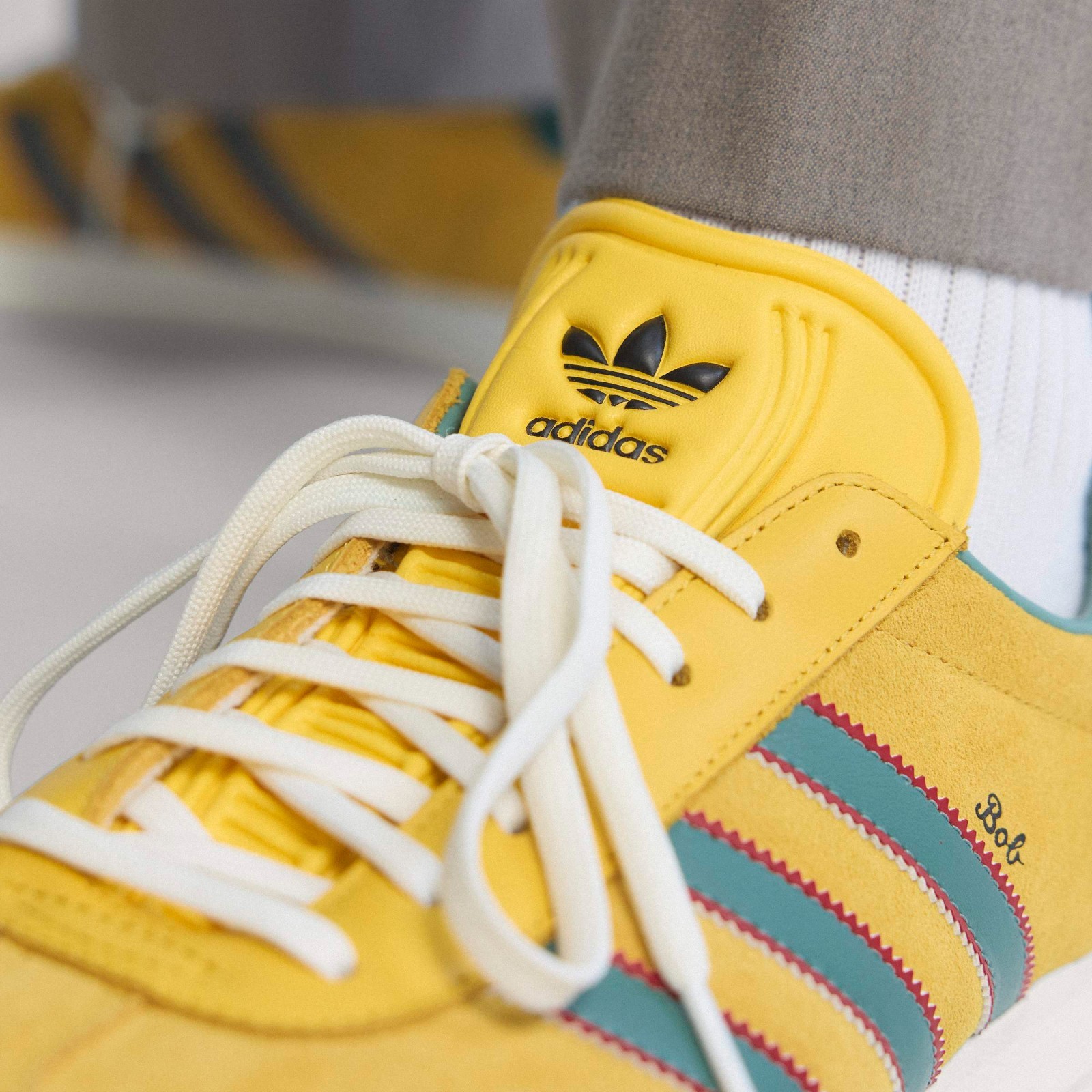 Adidas Men’s Gazelle Jamaica x Bob Marley Shoes Bold Gold/None/Pure Ruby KJ3532