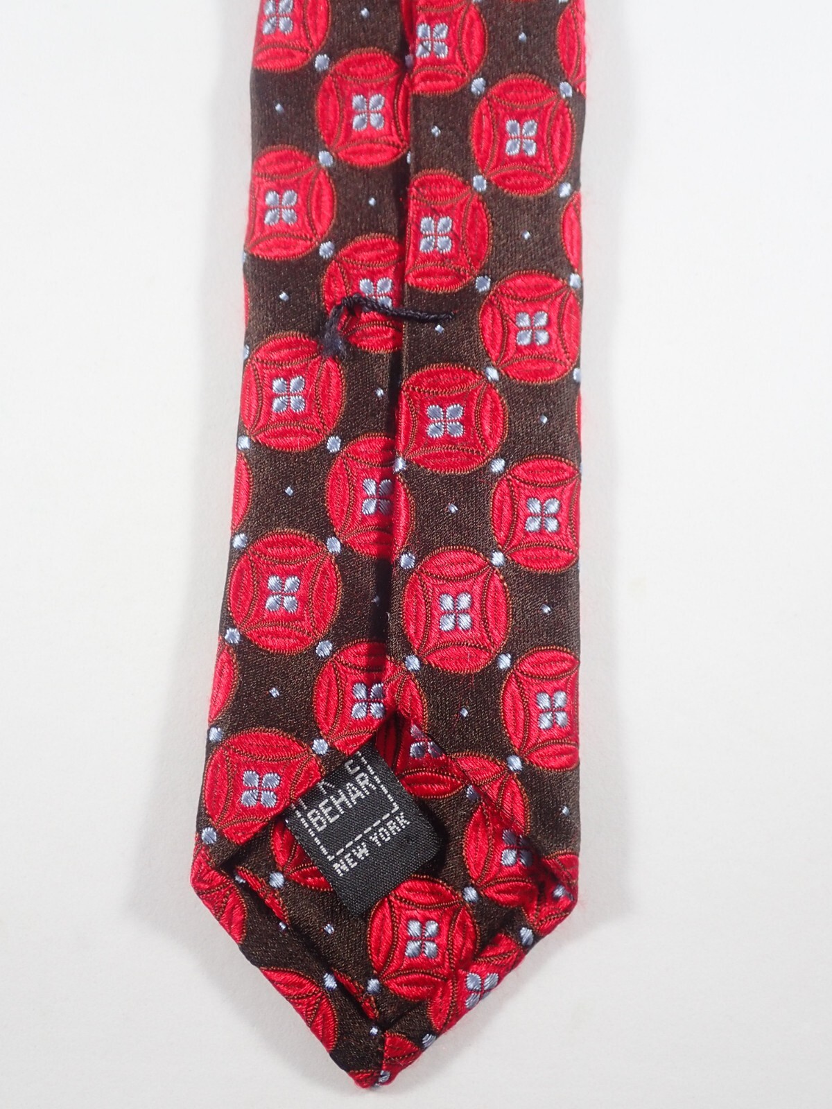 IKE BEHAR BLACK w/ RED CIRCLES & BLUE CENTERS 100% SILK NECK TIE