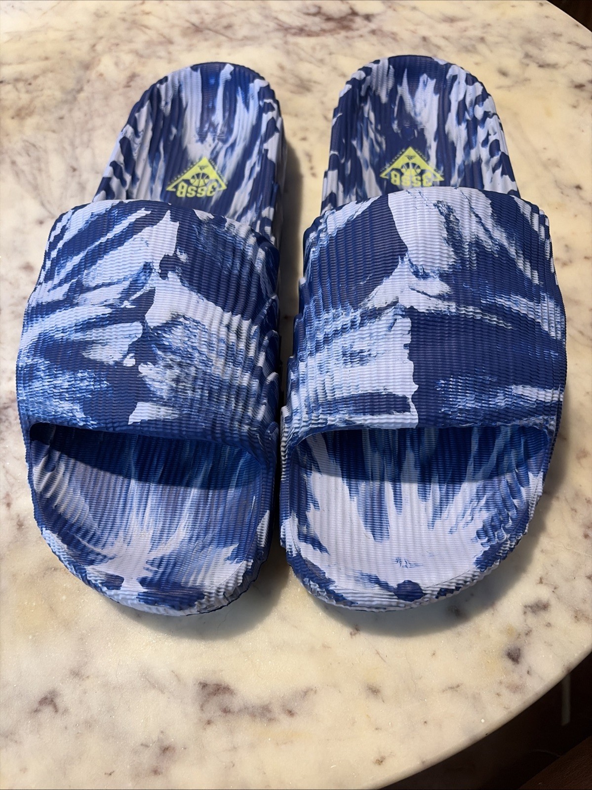 NWOT Adidas Adilette 22 Slides featuring a blue marble or tie-dye pattern