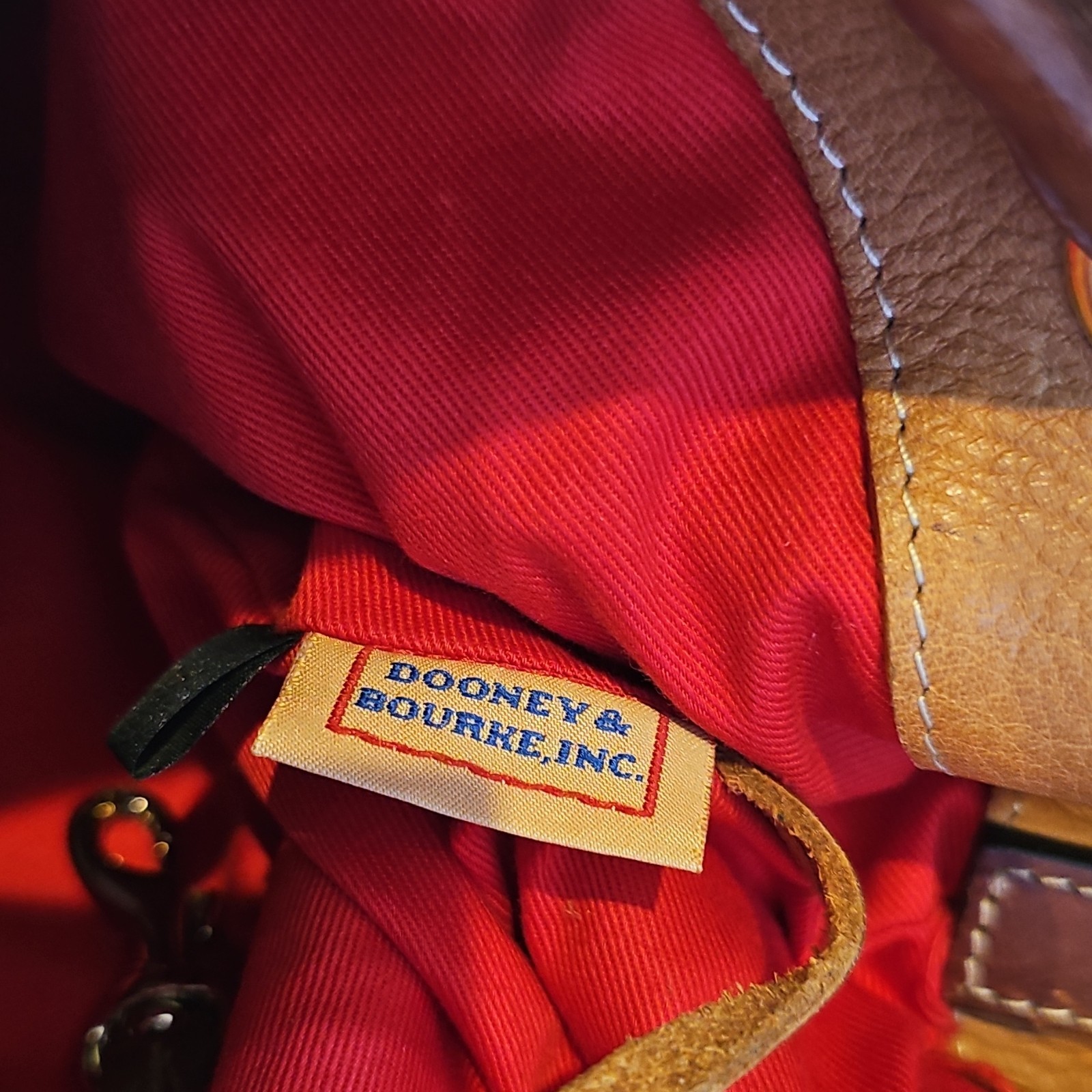 Dooney & Bourke Tan Pebbled Leather Drawstring Bucket Bag Tassel Shoulder Purse