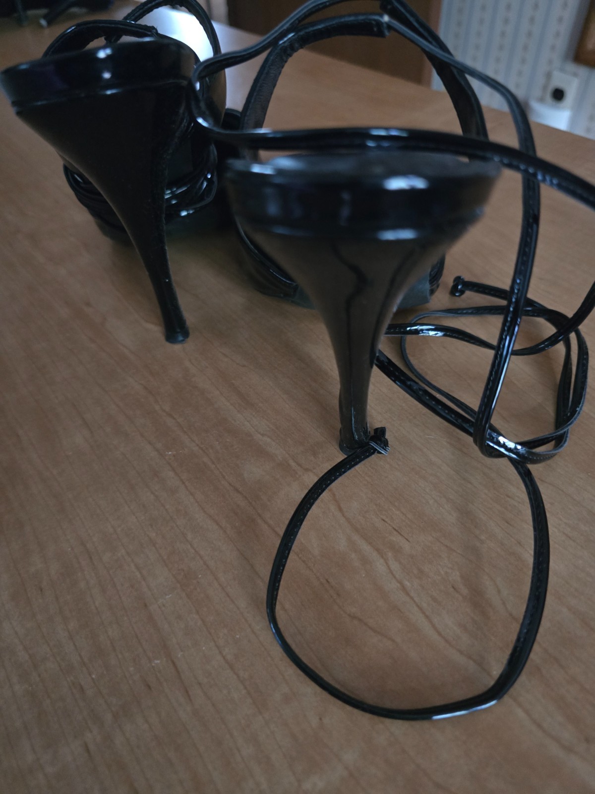 stiletto heels size 11 black patent leather. Wrapped string around ankles