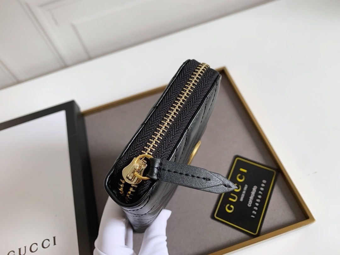 Gucci wallet black with gold GG zip around