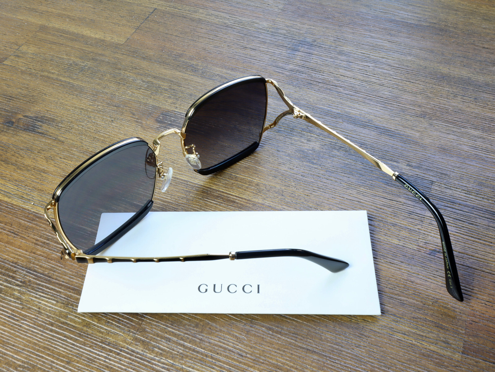 Gucci GG0593SK 001 59mm Oversized Square Sunglasses in Black/Gold and Gray Lens