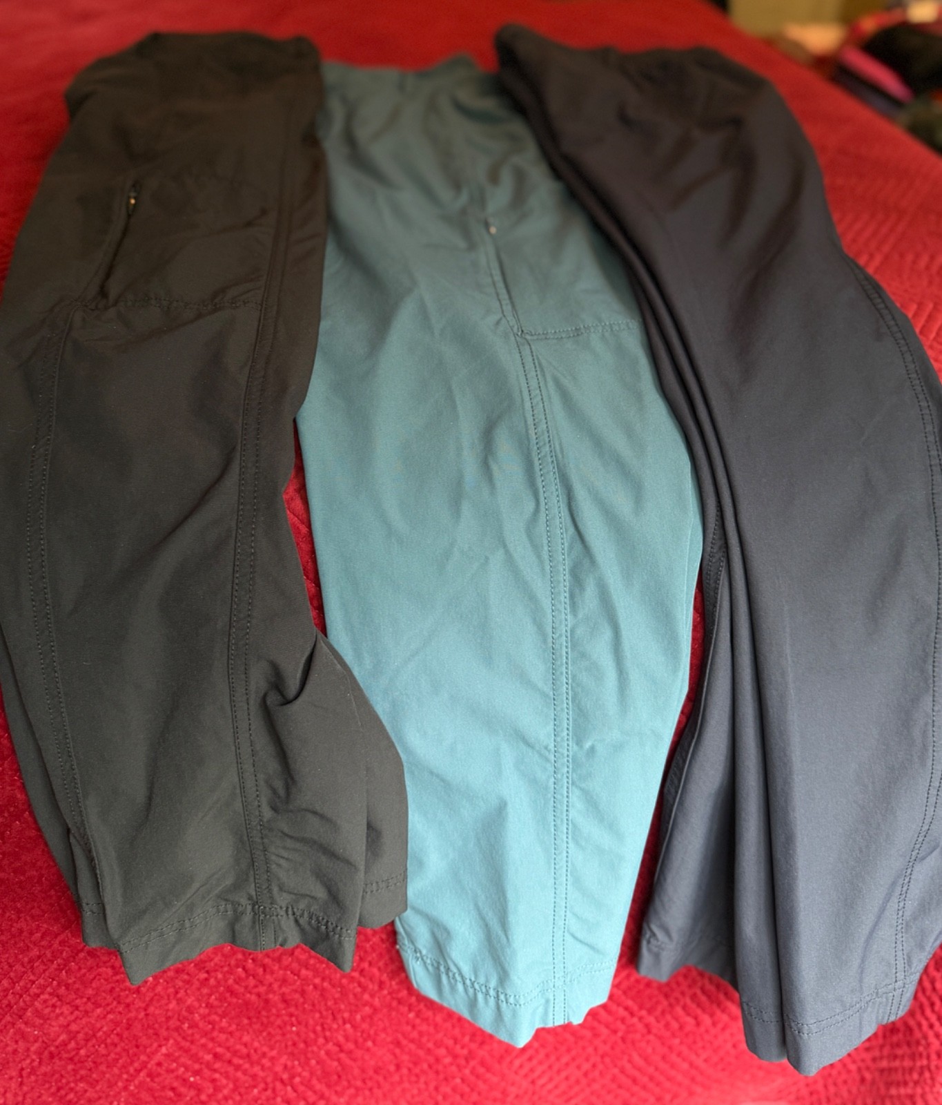 Kirkland Ladies Travel Pants. Three pair. Black, Medium blue, Navy size 12
