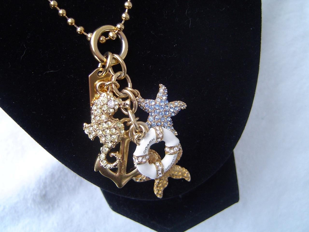 AUTHENTIC COACH GOLD TONE PIERRE LE TAN NAUTICAL CHARMS 28″ NECKLACE EUC