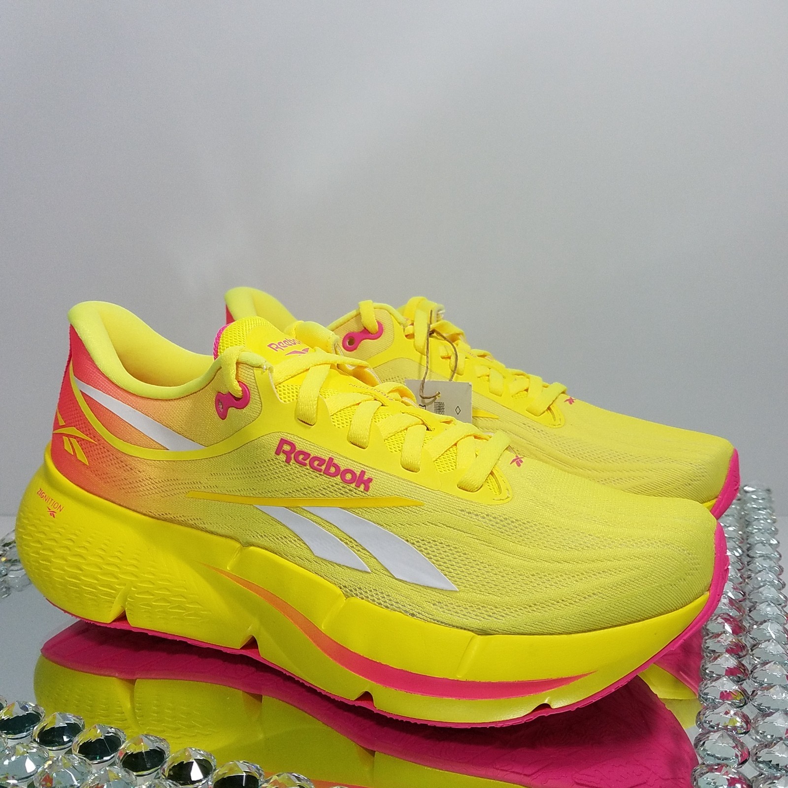 Reebok Zignition “Electric Yellow Atomic Pink” – Women’s Size 7.5 – 100233834
